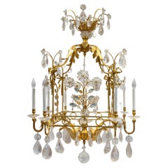 Antique 20th Century Opulent Rock Crystal Chandelier with foliage and ribbon motif