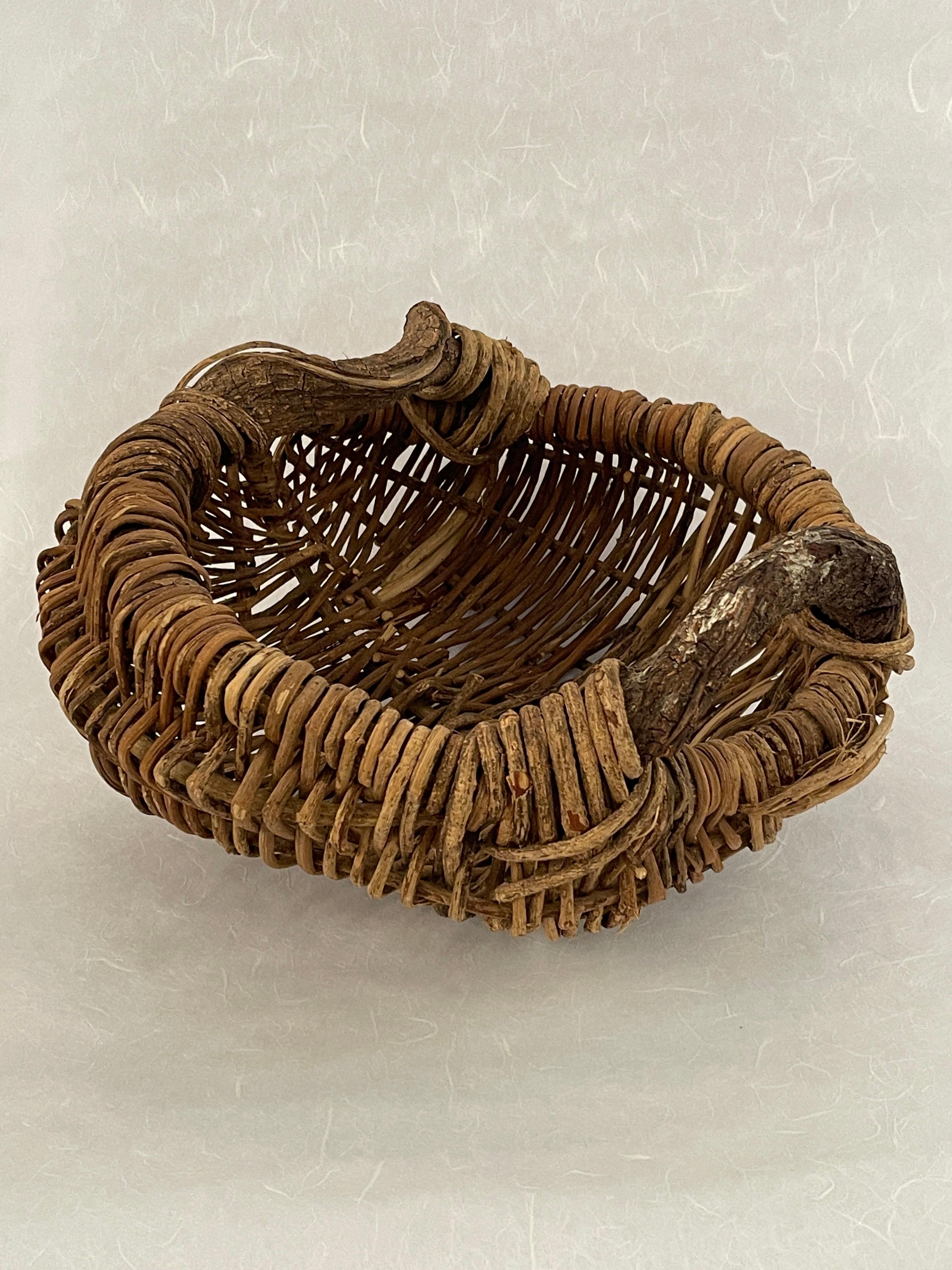 Rustic 20th Century Organic Handled Woven Basket For Sale