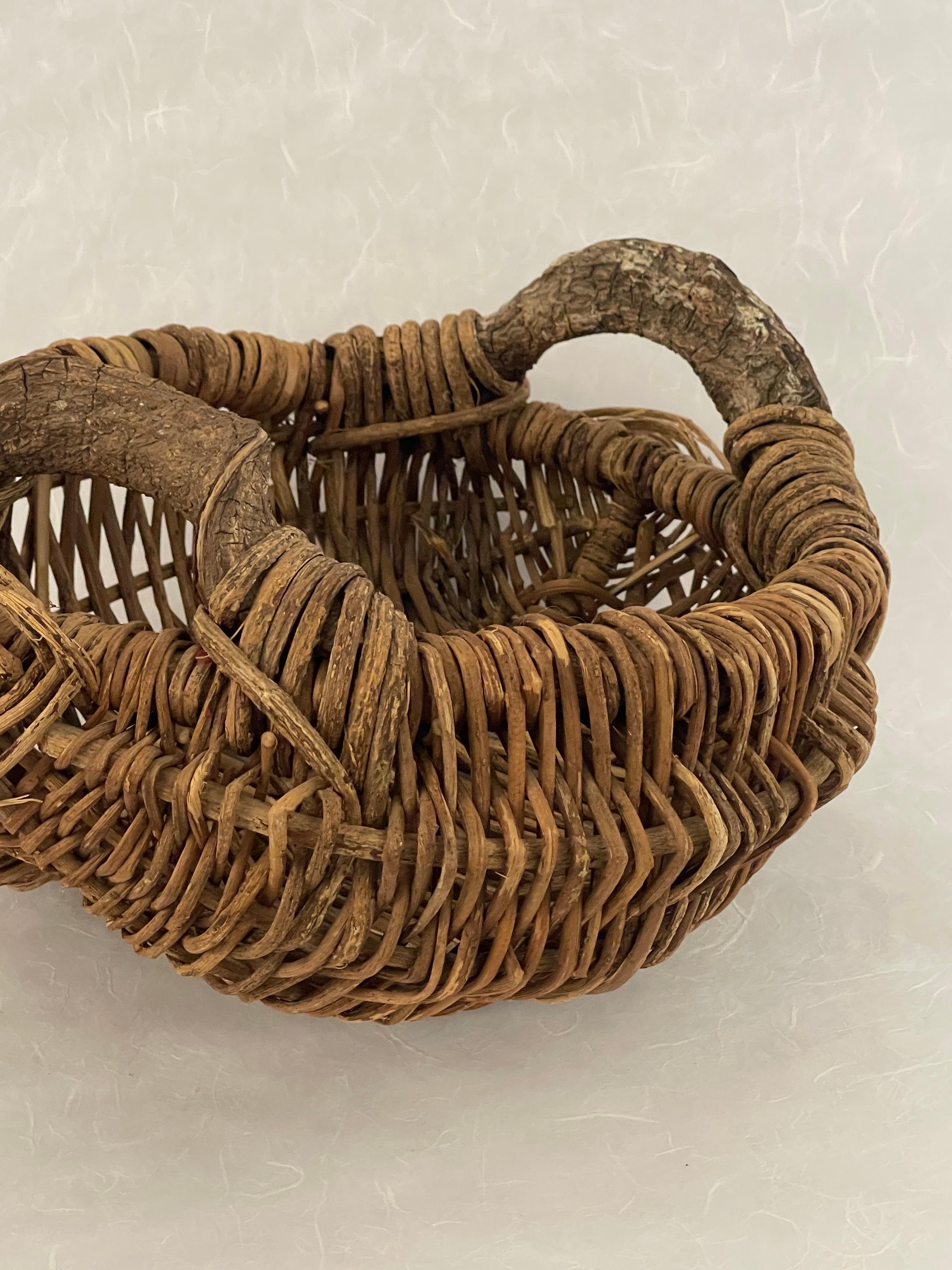 20th Century Organic Handled Woven Basket For Sale 1