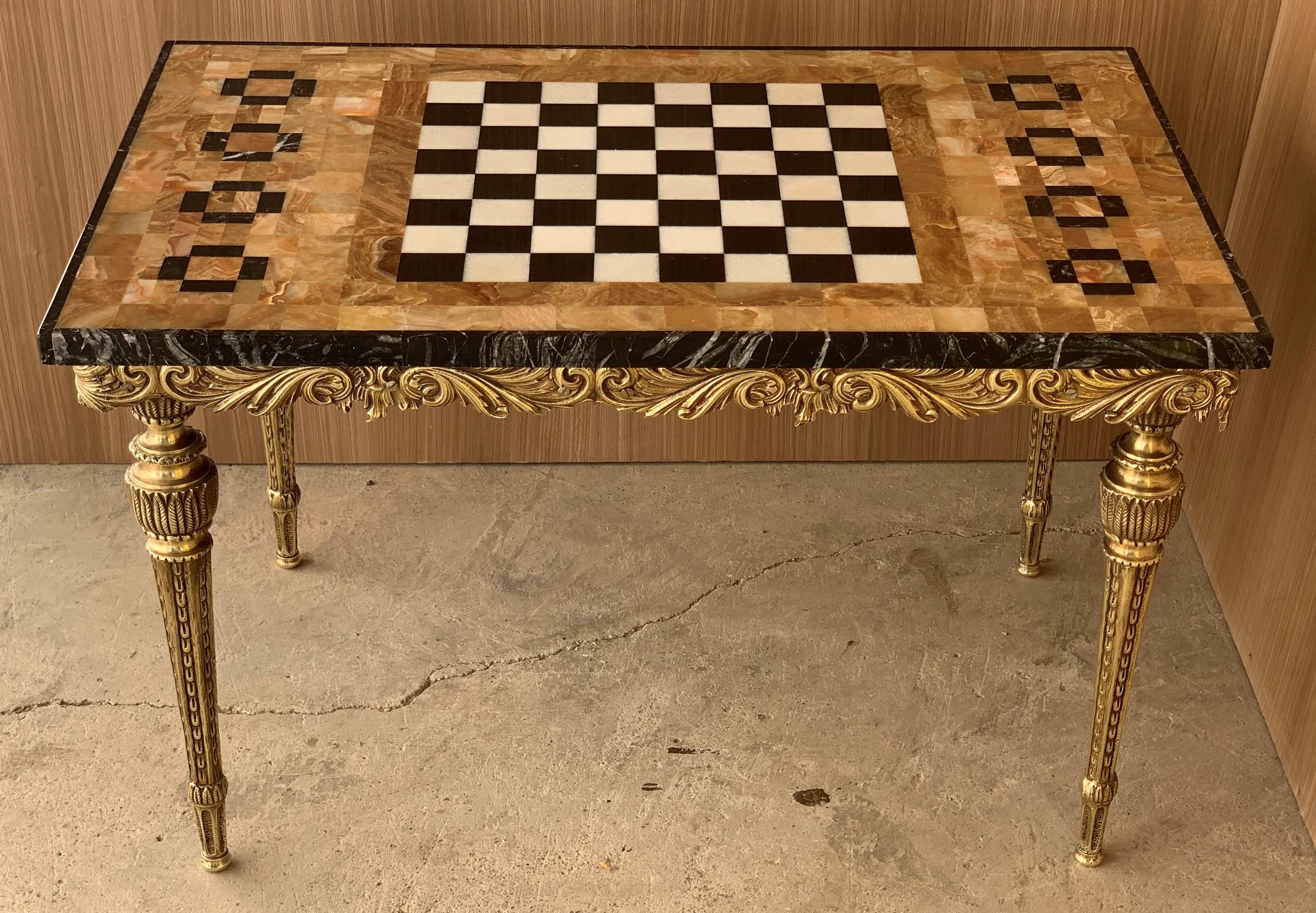20th century bronze game of chess with marble and bronze table
Top marble in perfect shape with beautiful ormolu-mounted bronze edges and solid bronze legs.