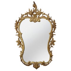 Miroir mural Louis XVI du XXe siècle, en métal ouvragé, orné de motifs rococo, France