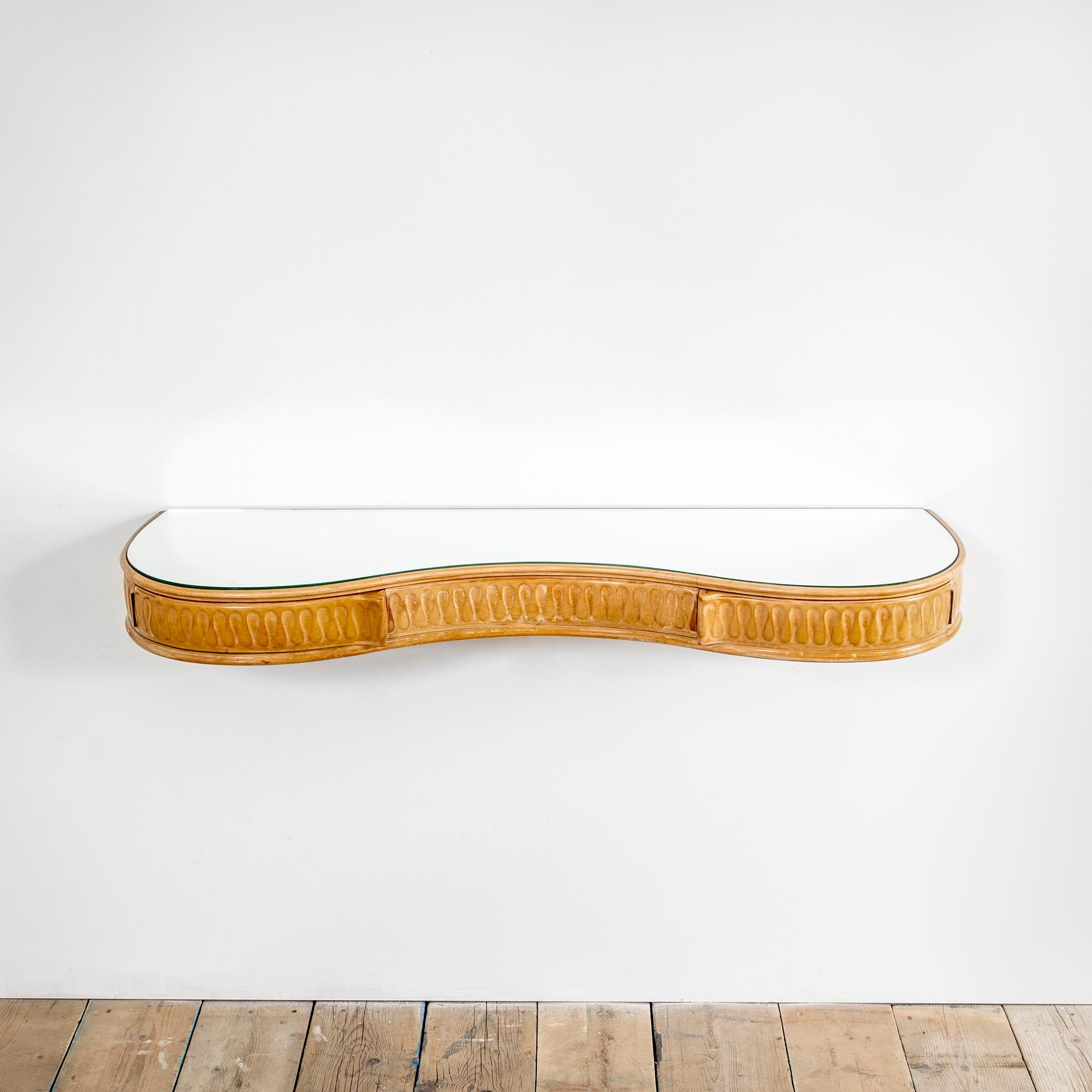 Hanging console table with maple wood frame, shaped glass top and concealed drawers with compass closure. The console was designed by Osvaldo Borsani and produced by Arredamenti Borsani Varedo in 1942. The design was especially made for a private