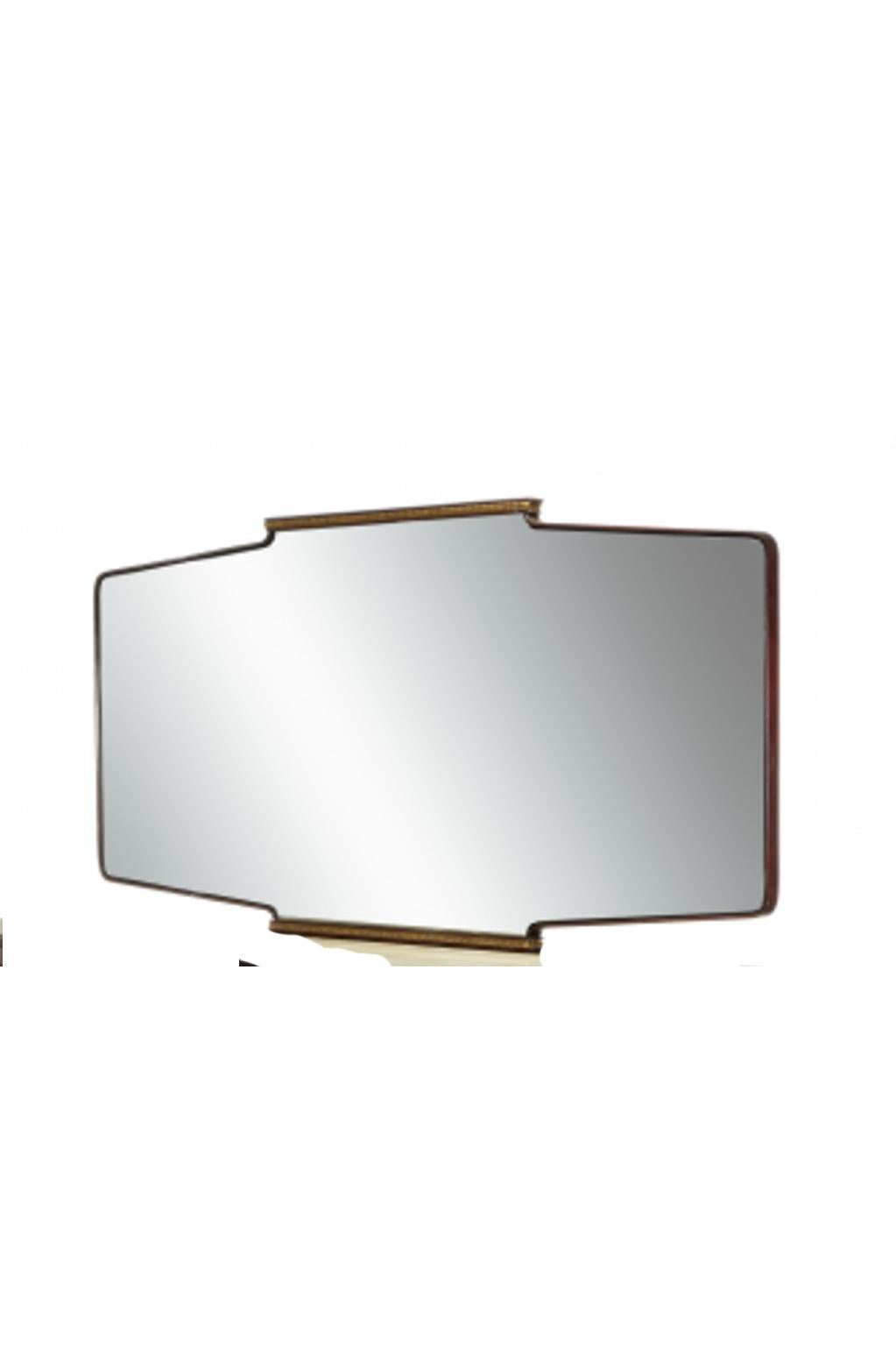 Osvaldo Borsani buffet with Large rectangular-shaped mirror (concave edges) in wood edged in polished brass. Solid wood and Indian rosewood veneer, brass trimmings, back-painted glass top, and maple interior. Ferrules in cast brass.
Production