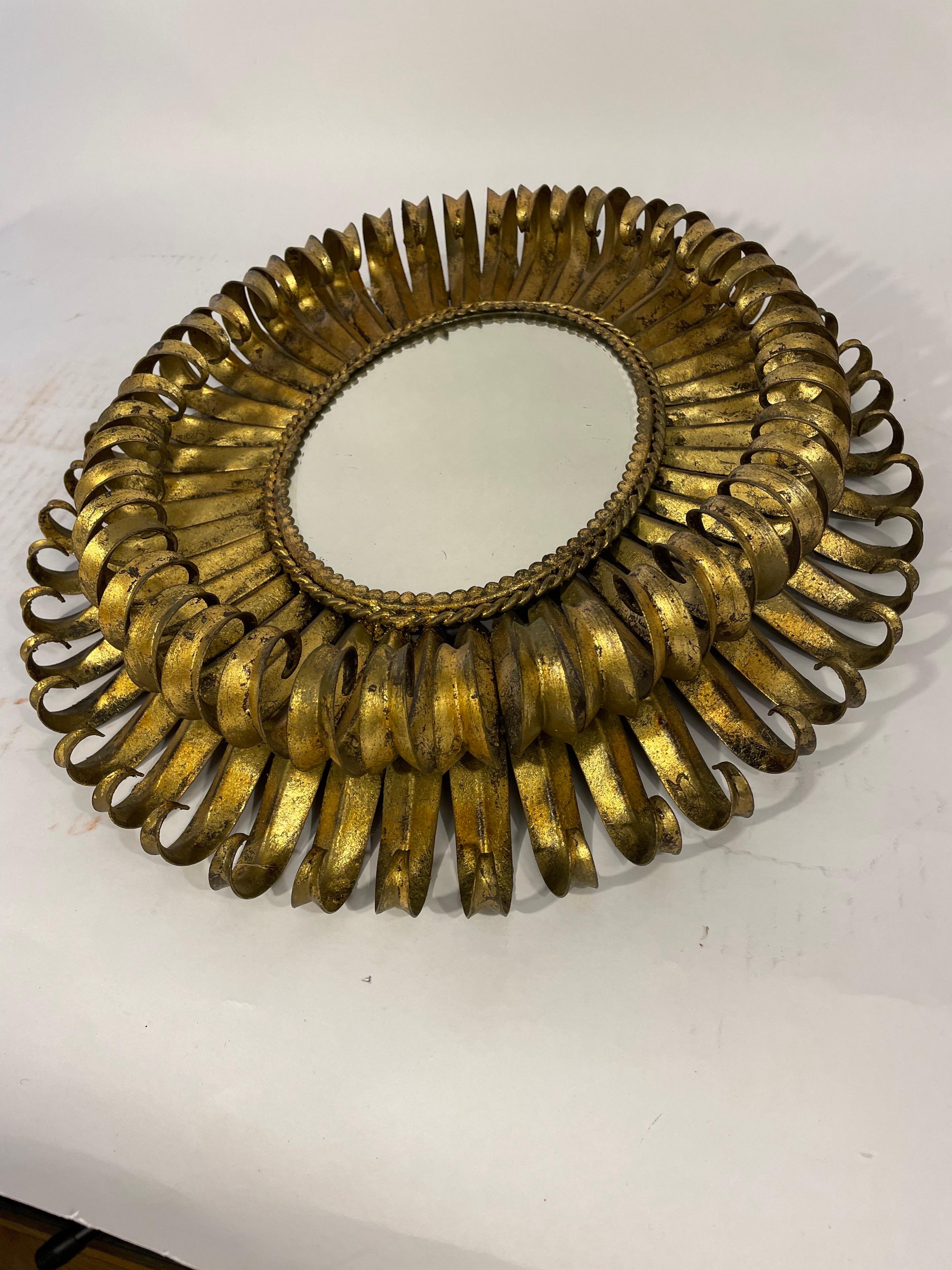 Spanish 20th century oval gilt eyelash mirror