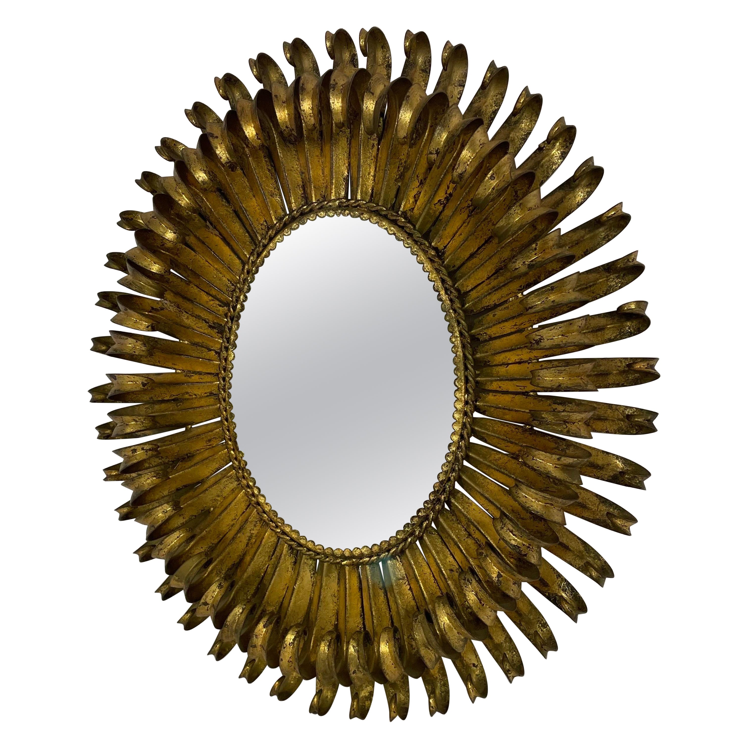 20th century oval gilt eyelash mirror