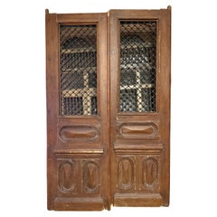 Siglo XX Par de Puertas Egipcias de Gran Tamaño con Paneles de Hierro y Madera