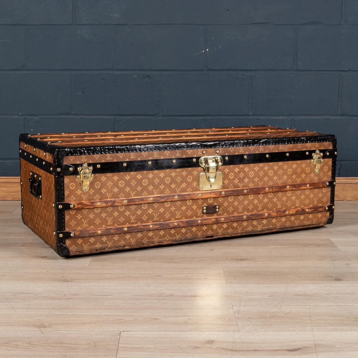 A very rare example of an oversized Louis Vuitton trunk in woven monogrammed canvas. What distinguishes this particular trunk from others is its unusual size. With a height of 40cm and a width of 120cm is was almost certainly a custom order and has