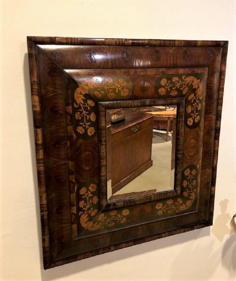 Step into the past with this enchanting 20th Century Double Cushion Olive Oyster Mirror—a timeless testament to the artistry and elegance of a bygone era. Crafted with meticulous attention to detail, this mirror stands as a captivating fusion of