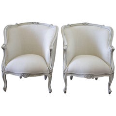 20th Century Painted and Upholstered Pair of Linen Bergere Chairs
