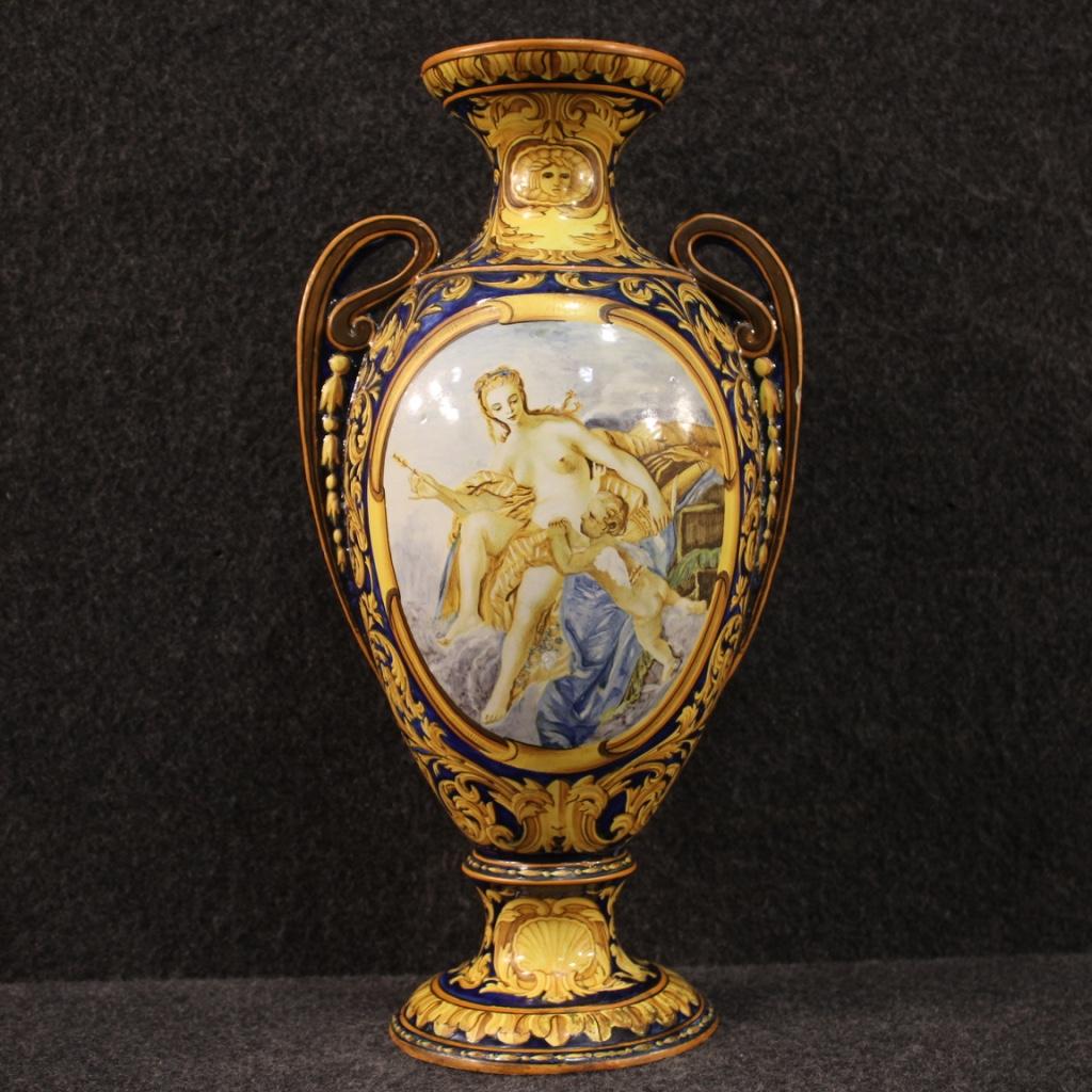 Italian cup from the mid-20th century. Hand painted ceramic object with landscape and scene in neoclassical style Venus and Love of good pictorial quality. Vase of beautiful size and pleasant decor signed under the base (see photo). Cup for antique