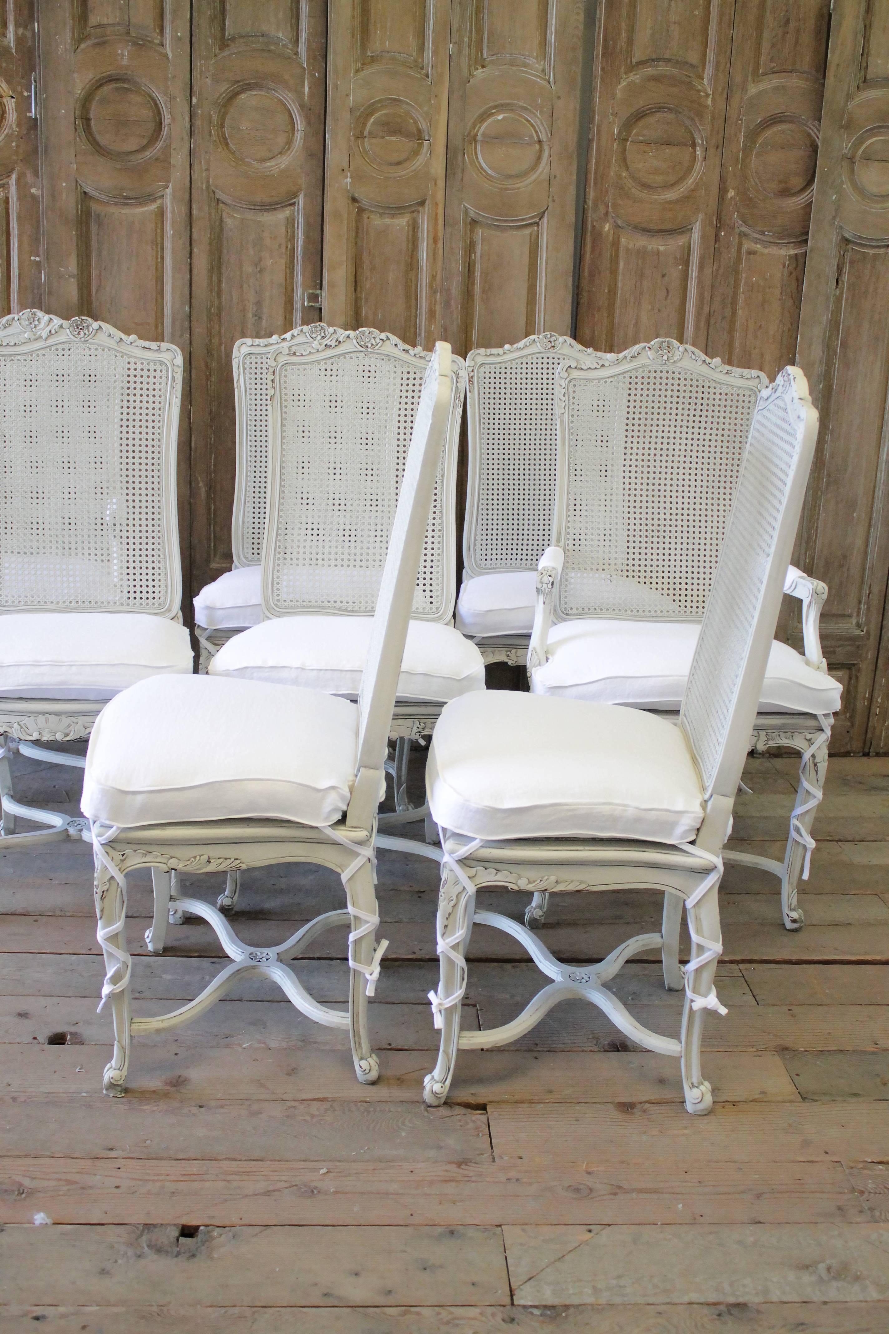 Spanish 20th Century Painted Louis XV Style Cane Back Dining Chairs with Linen Cushions