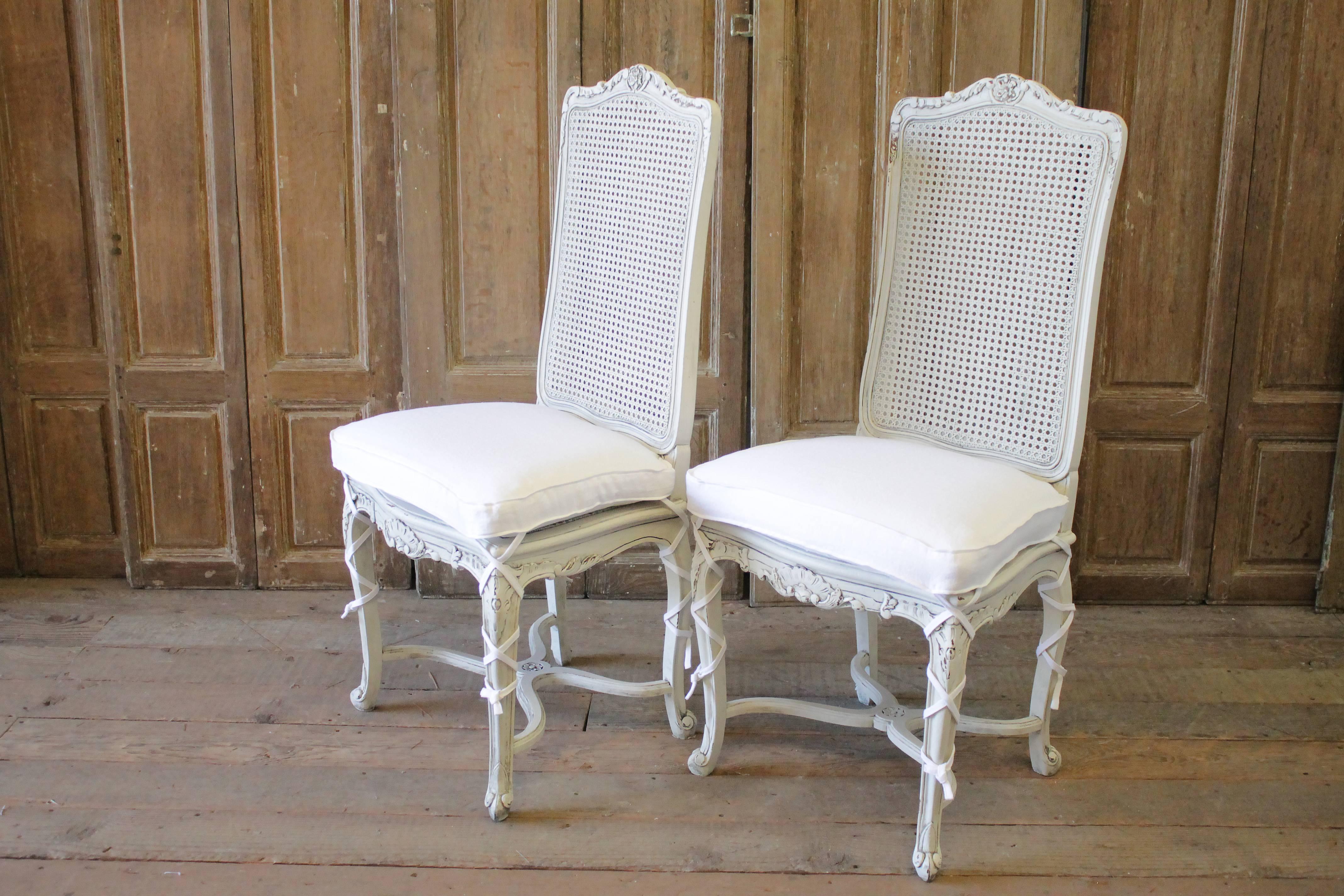 20th Century Painted Louis XV Style Cane Back Dining Chairs with Linen Cushions In Good Condition In Brea, CA