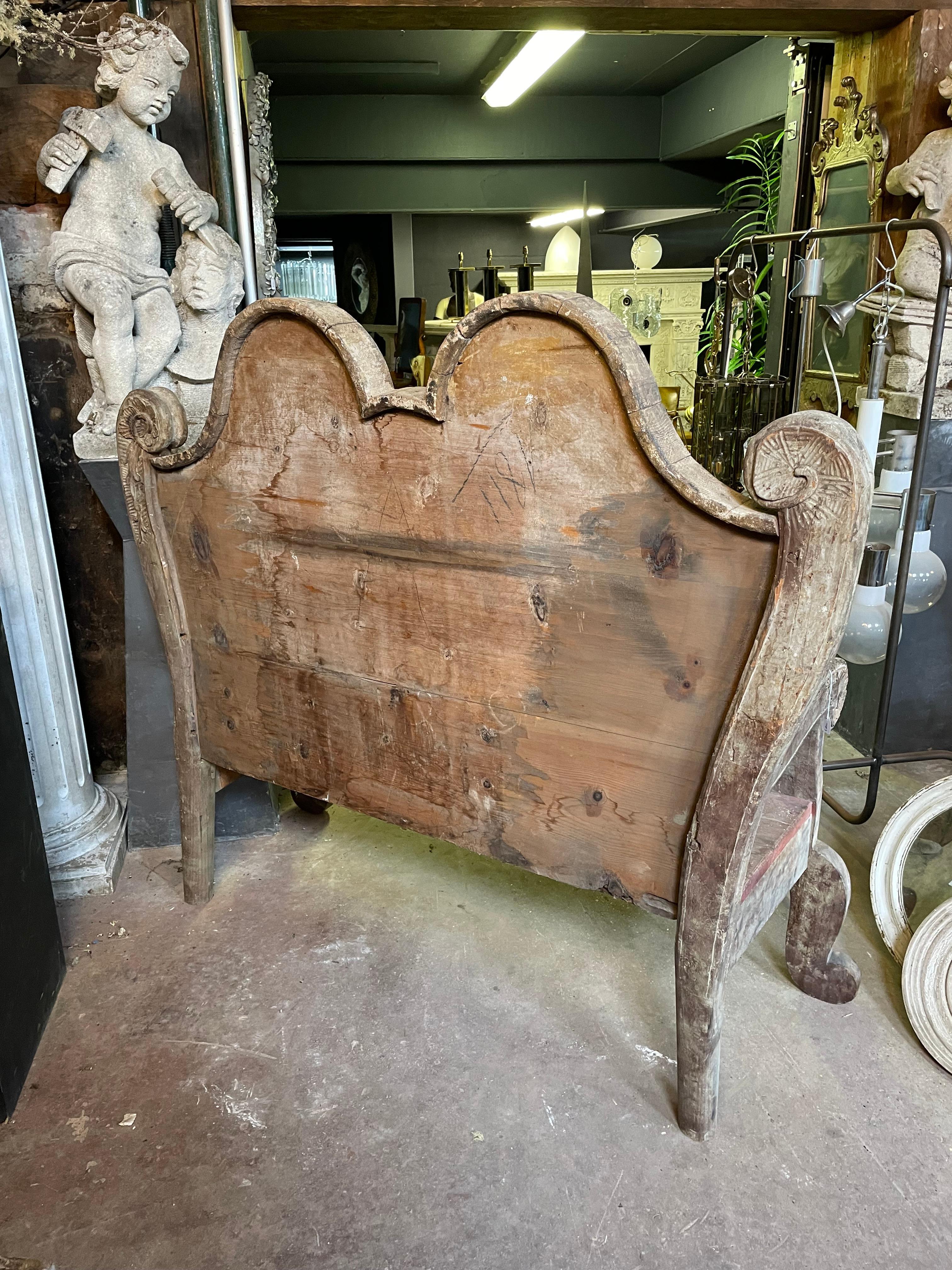 A very decoratve carved and painted settle / bench with influences from the mediterranean.

Early / Mid 20th Century.
 