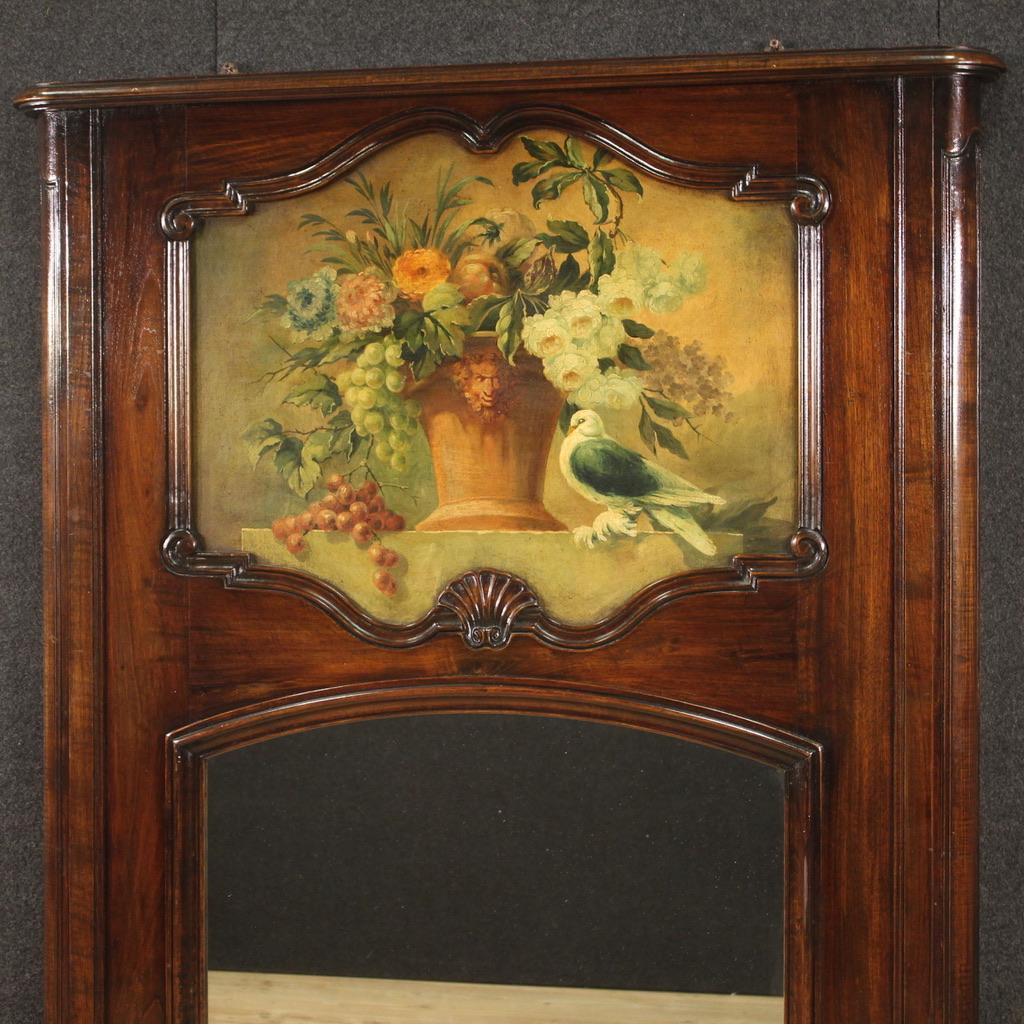 Great Italian mantelpiece mirror from the Mid-20th Century. Furniture carved in beech and walnut of great size and impact. Mirror equipped with original built-in mirror in perfect condition. In the upper part there is a recessed decorative wooden