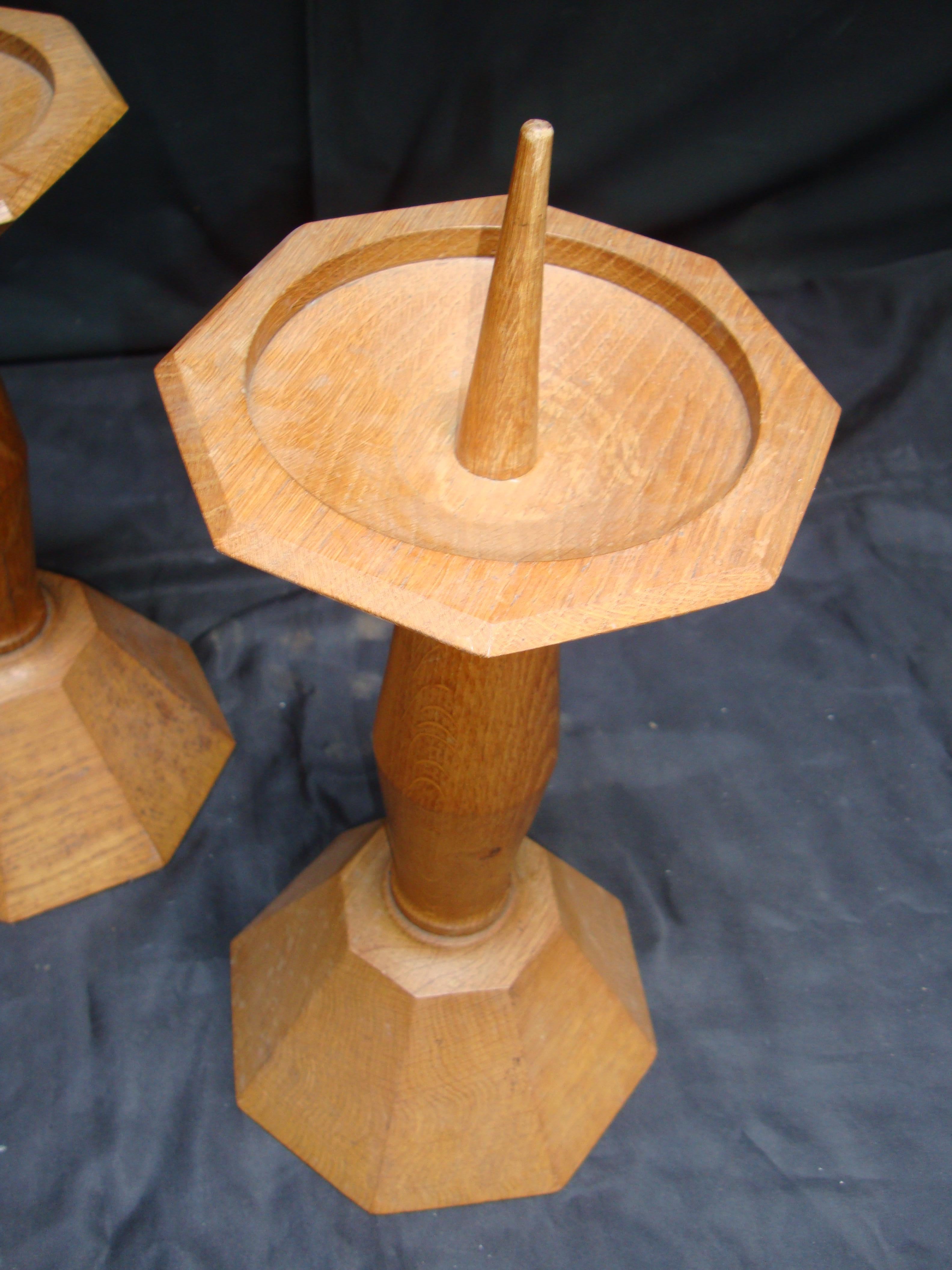 A pair of Italian deco period wooden candlesticks, circa 1930, the facetted shape, can be mounted into table lamps.