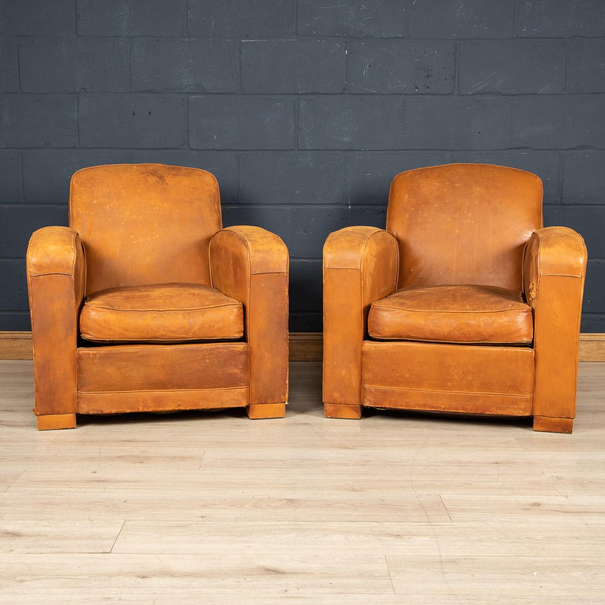 A gorgeous pair French leather club chairs, circa 1950. These armchairs have perennially oozed class and sophistication from the day they were made in the middle of the 20th century through to the modern day. These being the ever popular Art Deco