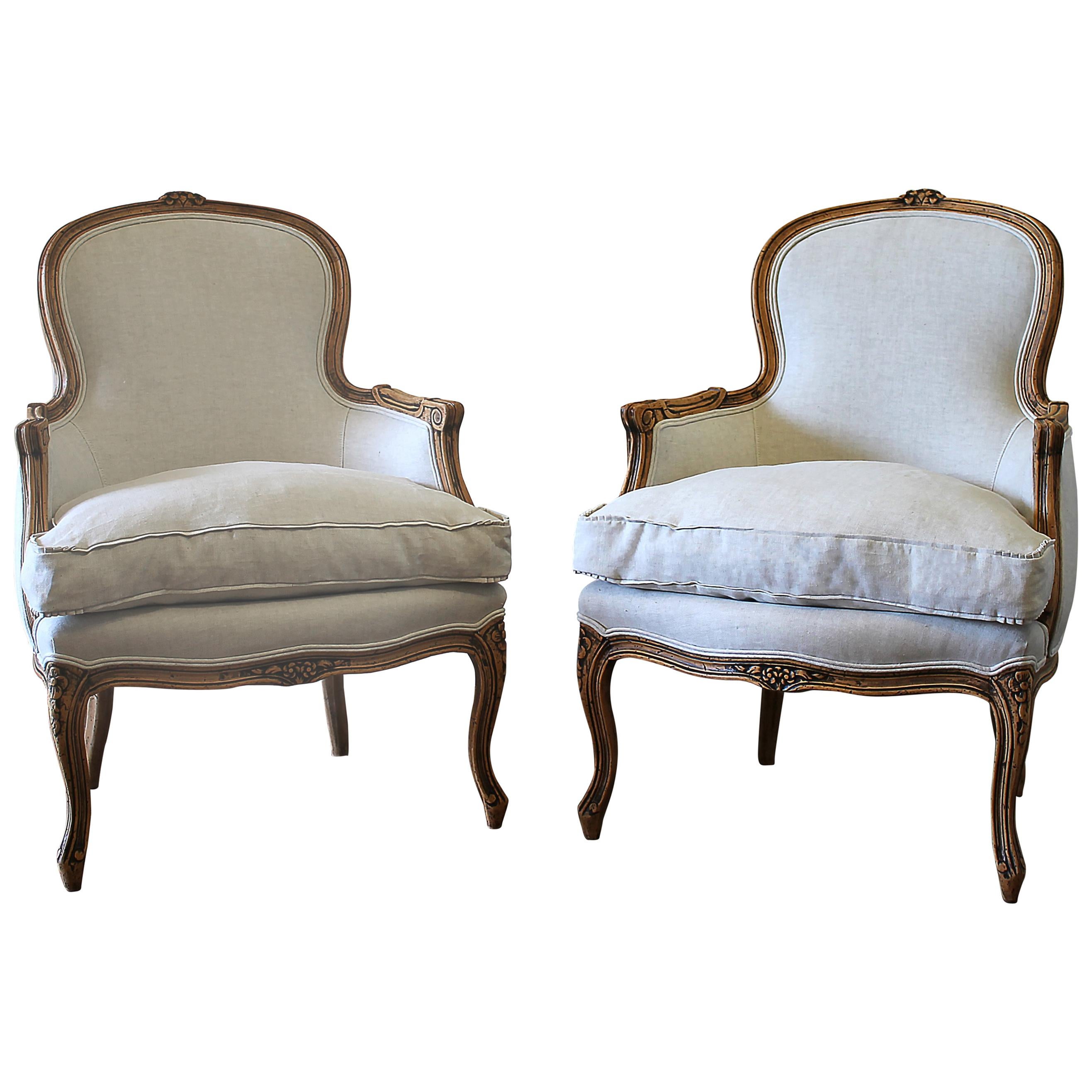 20th Century Pair of Carved & Upholstered Louis XV Style Bergère Chairs in Linen