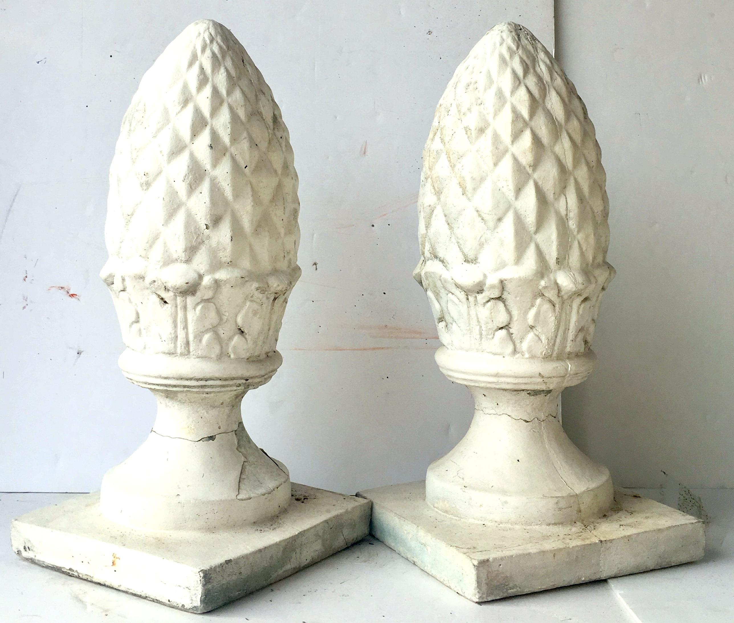 20th Century heavy cast stone square base textured cone finial sculptures.