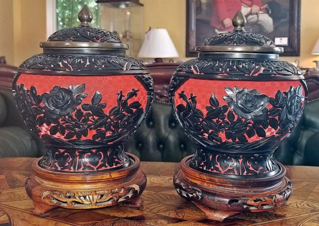 Hand-Carved 20th Century Pair of Chinese Cinnabar and Enamel Lidded Urns on Stand
