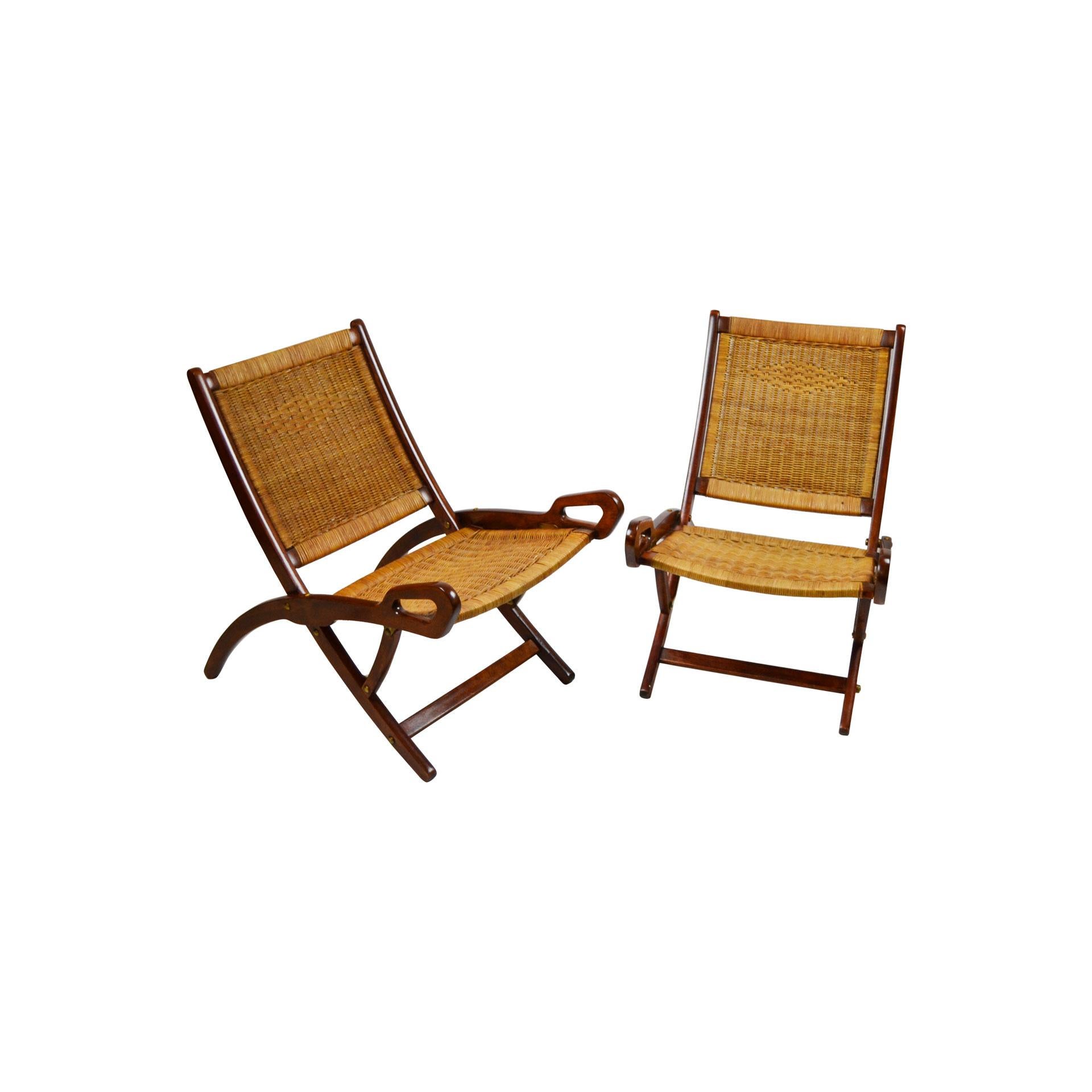 Pair of folding armchairs designed by Gio Ponti in 1950s for Brothers Reguitti Production. The two armchairs have a wood structure and the seat and backrest in woven rush, details in brass. Very good condition.
Presence of the brandmark 