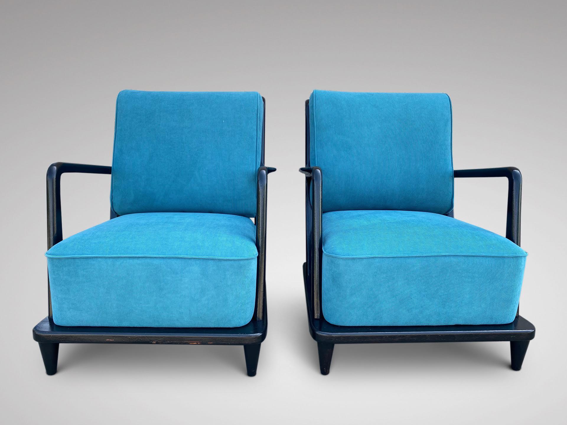 A pair of mid 20th century French black lacquered ebonised lounge armchairs. Newly reupholstered in quality petrol blue cotton corduroy fabric. Very comfortable. France 1950s. Very comfortable seating. The pair of chairs have recently been