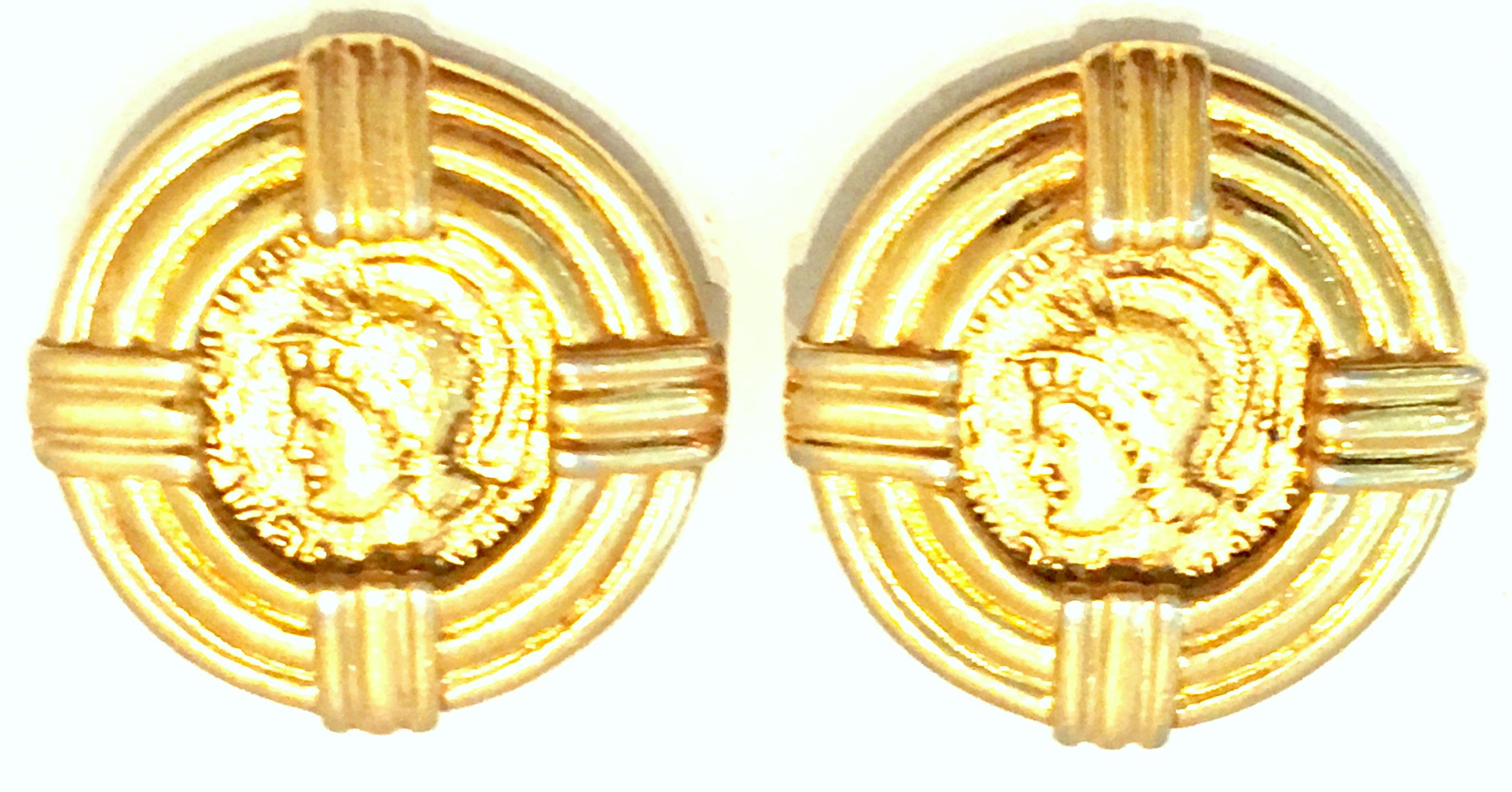 20th Century Pair Of Gold Plate Roman Coin Earrings By, Carolee. Each of these clip style earrings signed on the underside, Carolee.