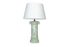 20th century pair of green and white porcelain ionic column table lamps