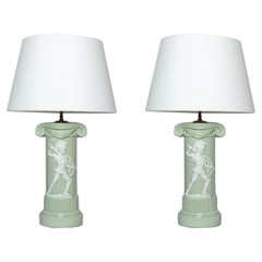 20th century pair of green and white porcelain ionic column table lamps