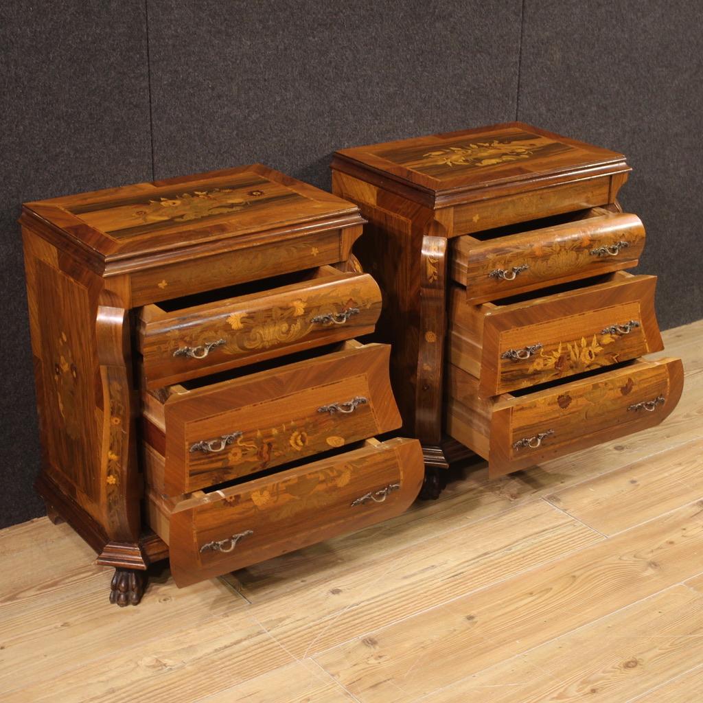 Pair of Italian bedside tables from the second half of the 20th century. Dutch-style furniture richly inlaid with floral decorations in walnut, rosewood, mahogany, maple, beech and fruitwood. Bedside tables equipped with three front drawers of good