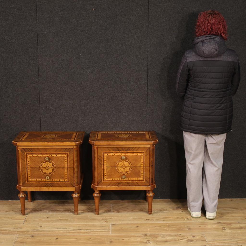 Elegant pair of Italian bedside tables in the Louis XVI style from the 20th century. Furniture of great character and quality in the Maggiolini style, richly inlaid in walnut, bois de rose, rosewood, maple and fruitwood. Bedside tables of excellent