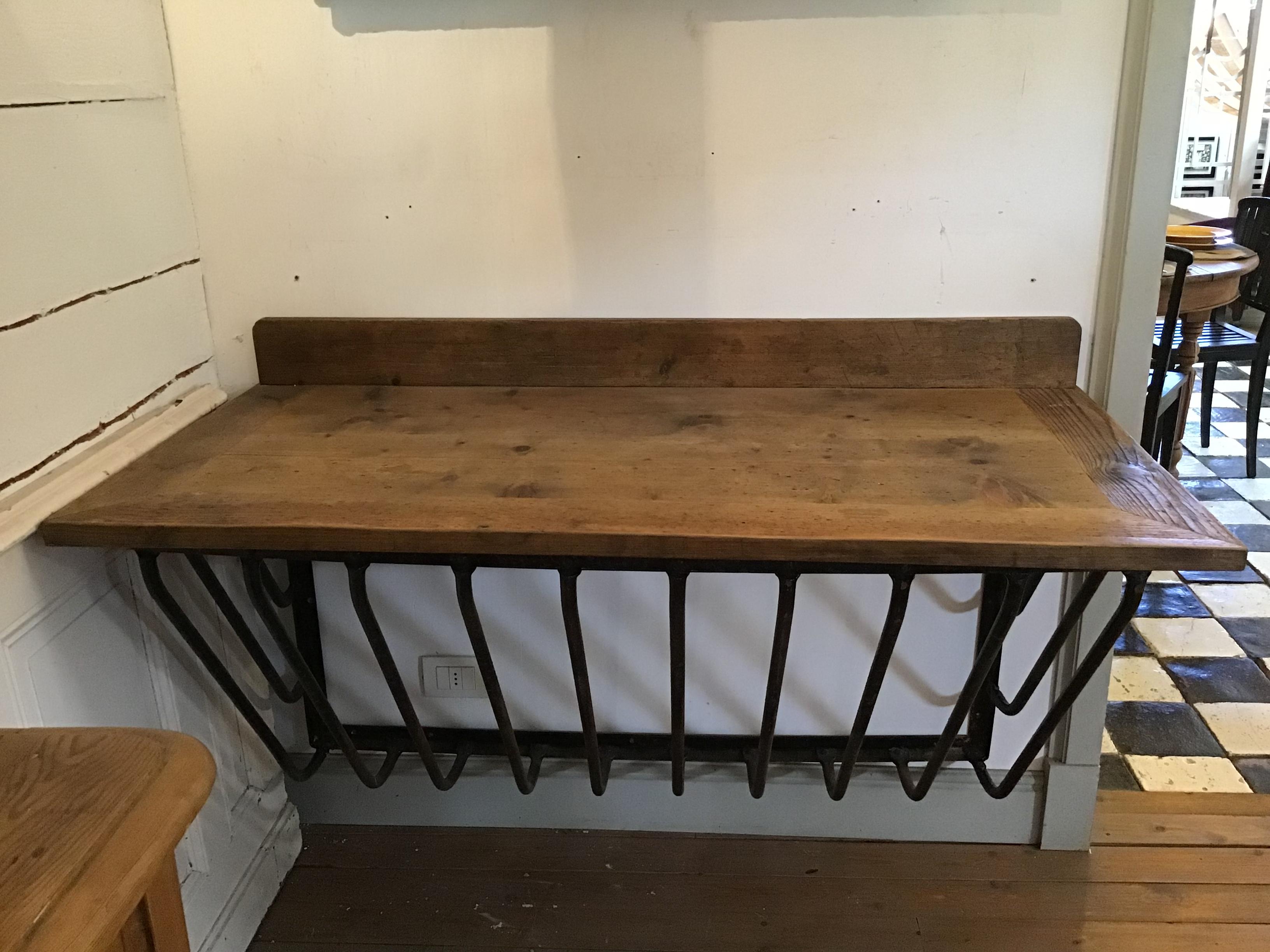 20th century pair of iron troughs and spruce top Italian consoles.
 
