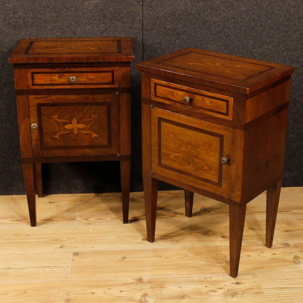 Pair of Italian bedside tables from 20th century. Louis XVI style furniture pleasantly inlaid in walnut, mahogany and maple wood. Nightstands with one drawer and a door of discreet service. They show some small signs of wear, overall in good state