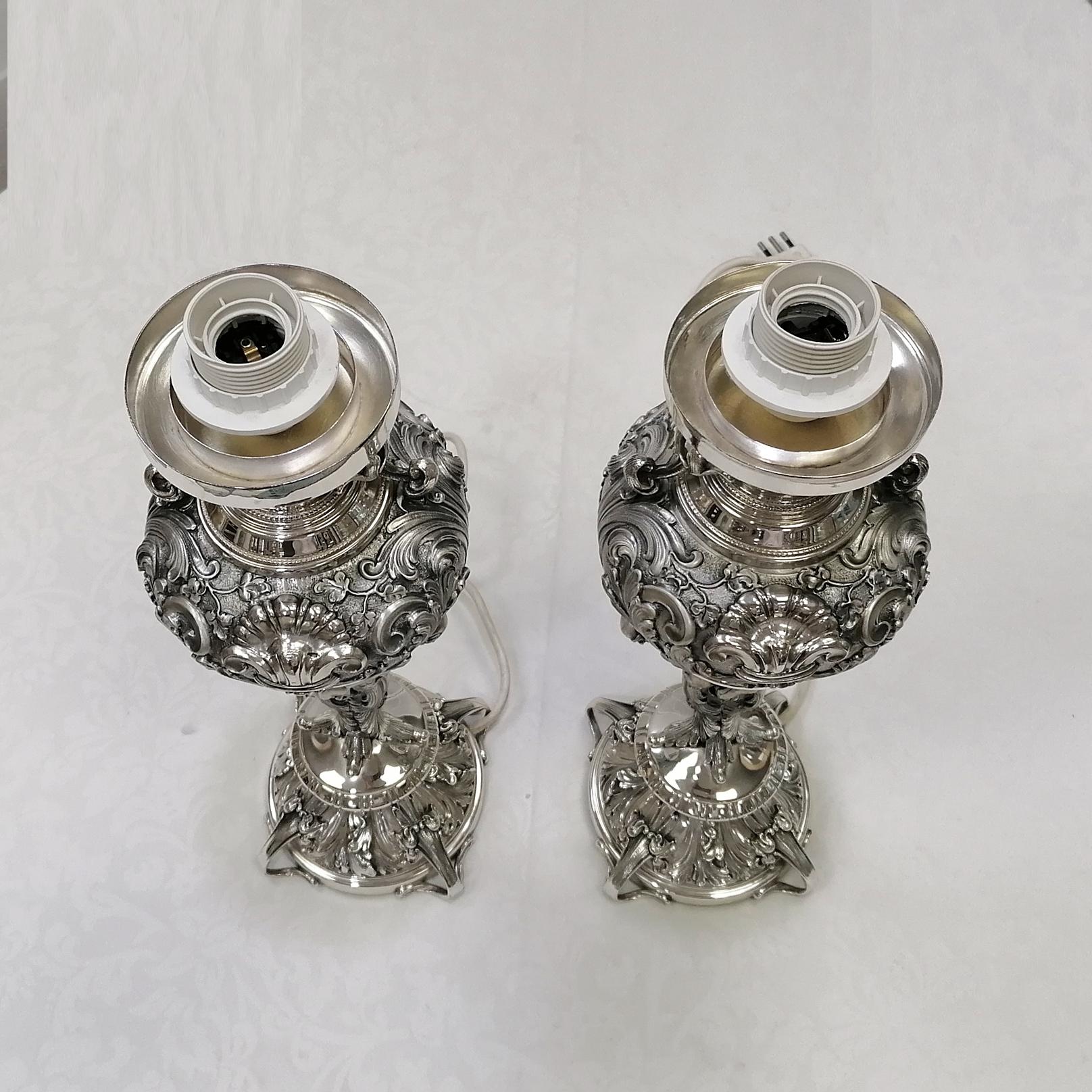 Baroque 20th Century Pair of Italian Silver embossed with figures Lamps For Sale