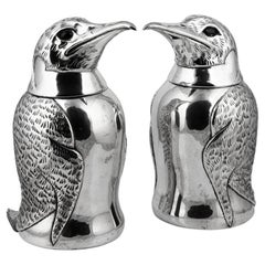Siglo XX Pareja de enfriadores de vino italianos con forma de pingüino chapados en plata