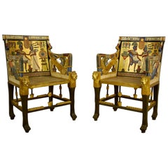 Siglo XX, Pareja de sillones de madera dorada lacada de estilo renacimiento egipcio