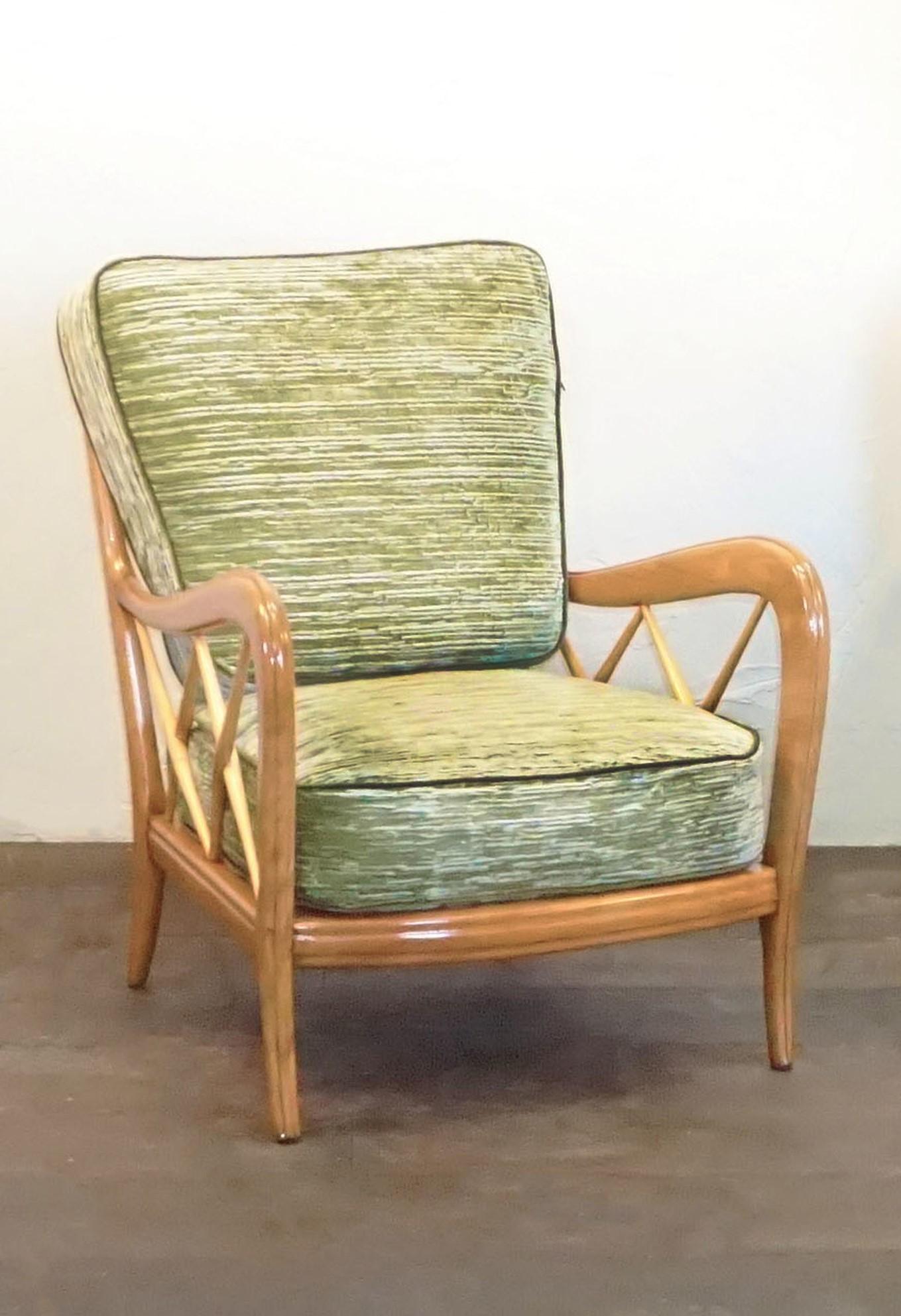 A vintage Mid-Century Modern Italian pair of lounge chairs made of walnut and green velvet fabric. Designed by Paolo Buffa in good condition. Wear consistent with age and use, circa 1950, Milan, Italy.

Seat: 16” H x 20