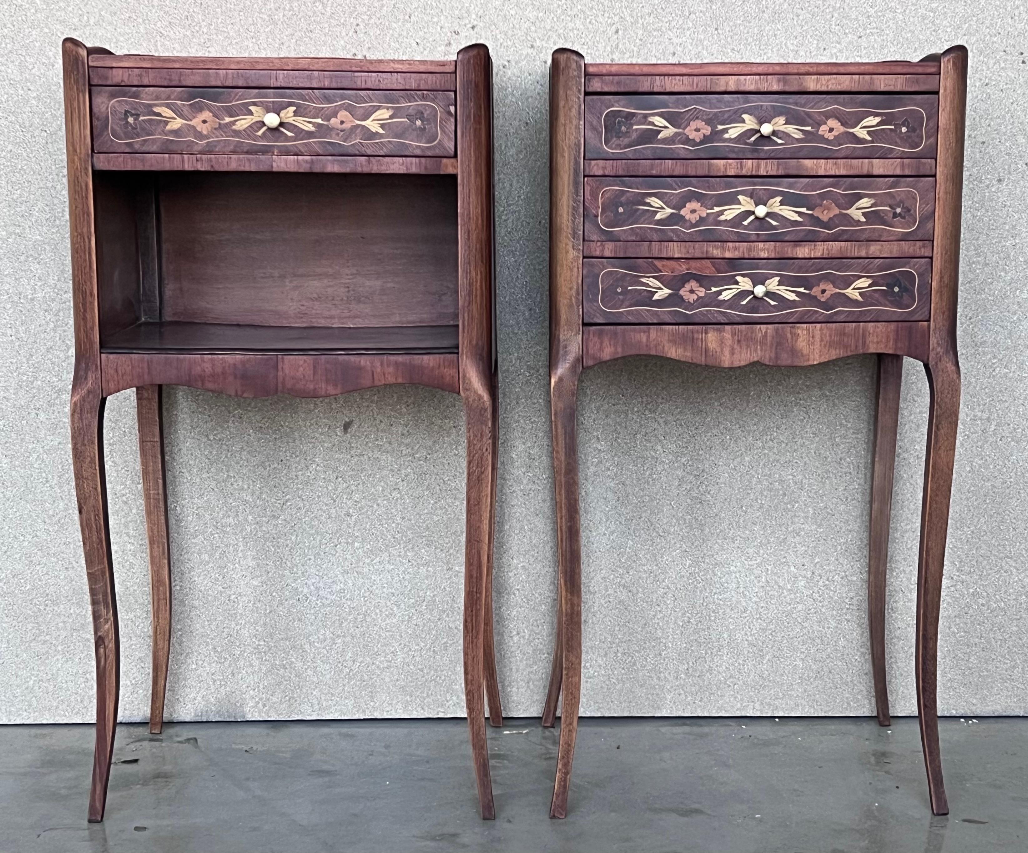 A pretty pair of French, inlaid kingwood, one drawer nightstands with tray accents, circa 1930.
Pair of French Louis XV style walnut bedside tables from the early 20th century. This pair of French 'tables de chevet' was created in the early years