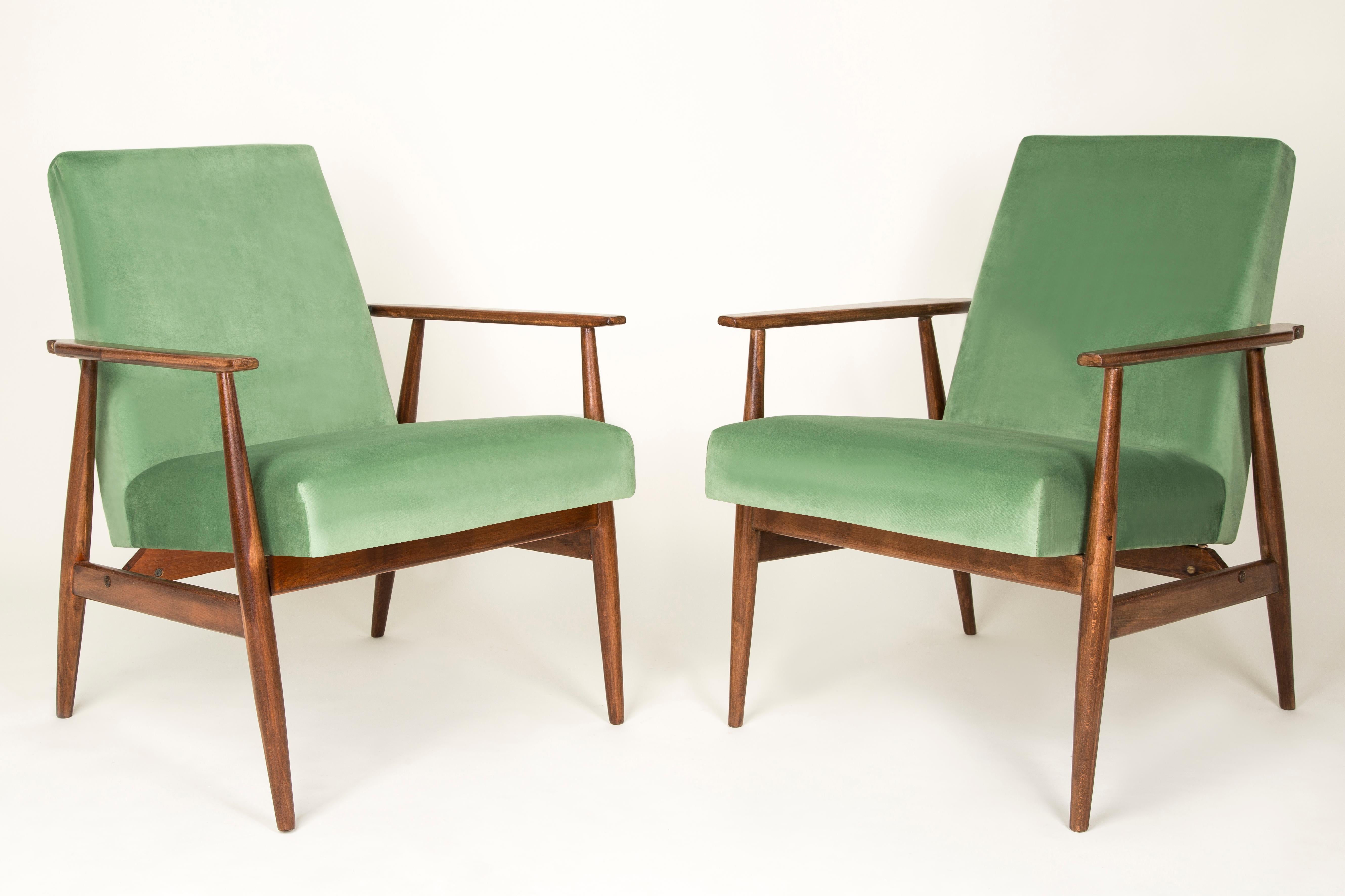 A beautiful, restored armchairs designed by Henryk Lis. Furniture after full carpentry and upholstery renovation. The fabric, which is covered with a backrest and a seat, is a high-quality velor upholstery. The armchairs will be perfect in