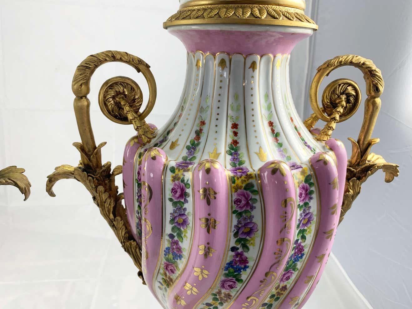 20th Century Pair of Ormolu Mounted Pink Sevres Style Vases with Lids For Sale 4