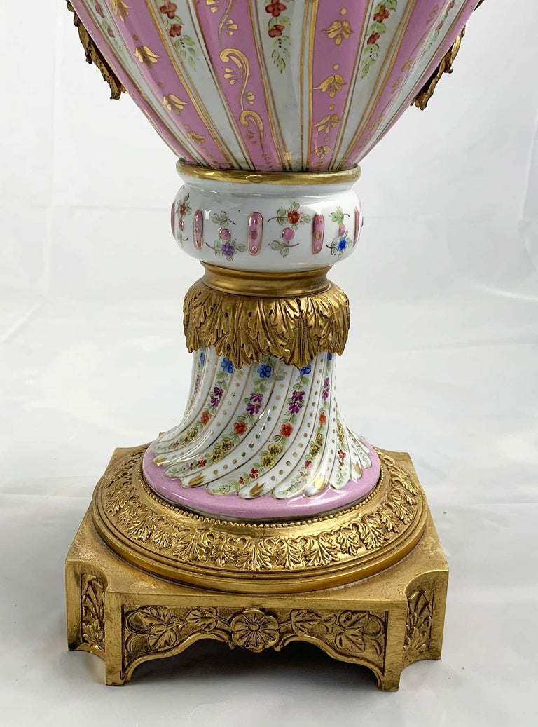 20th Century Pair of Ormolu Mounted Pink Sevres Style Vases with Lids