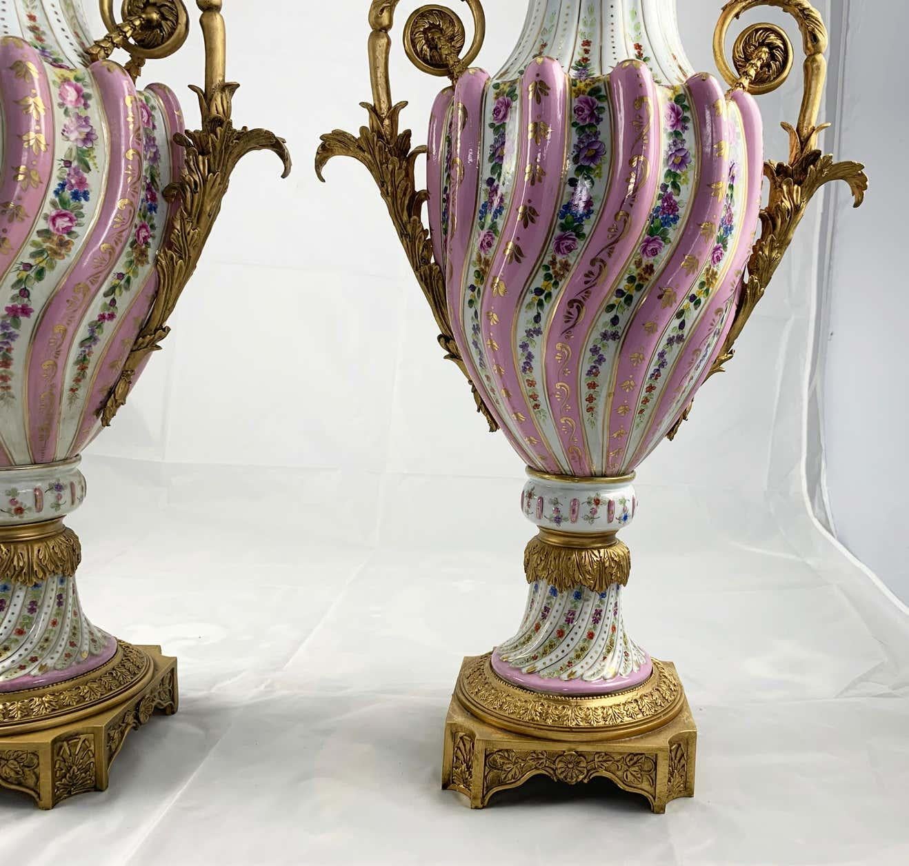 20th Century Pair of Ormolu Mounted Pink Sevres Style Vases with Lids For Sale 6