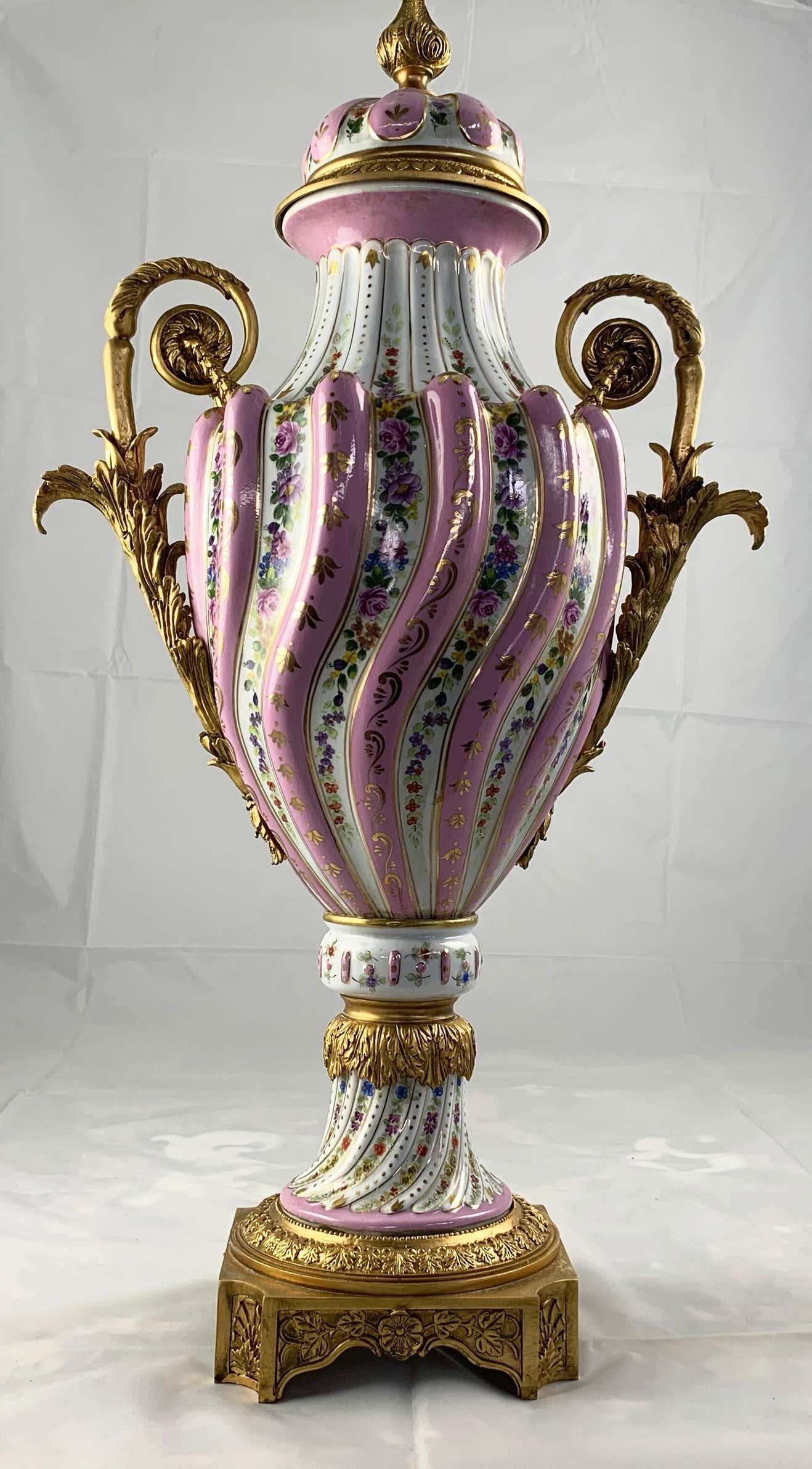 20th Century Pair of Ormolu Mounted Pink Sevres Style Vases with Lids For Sale 8