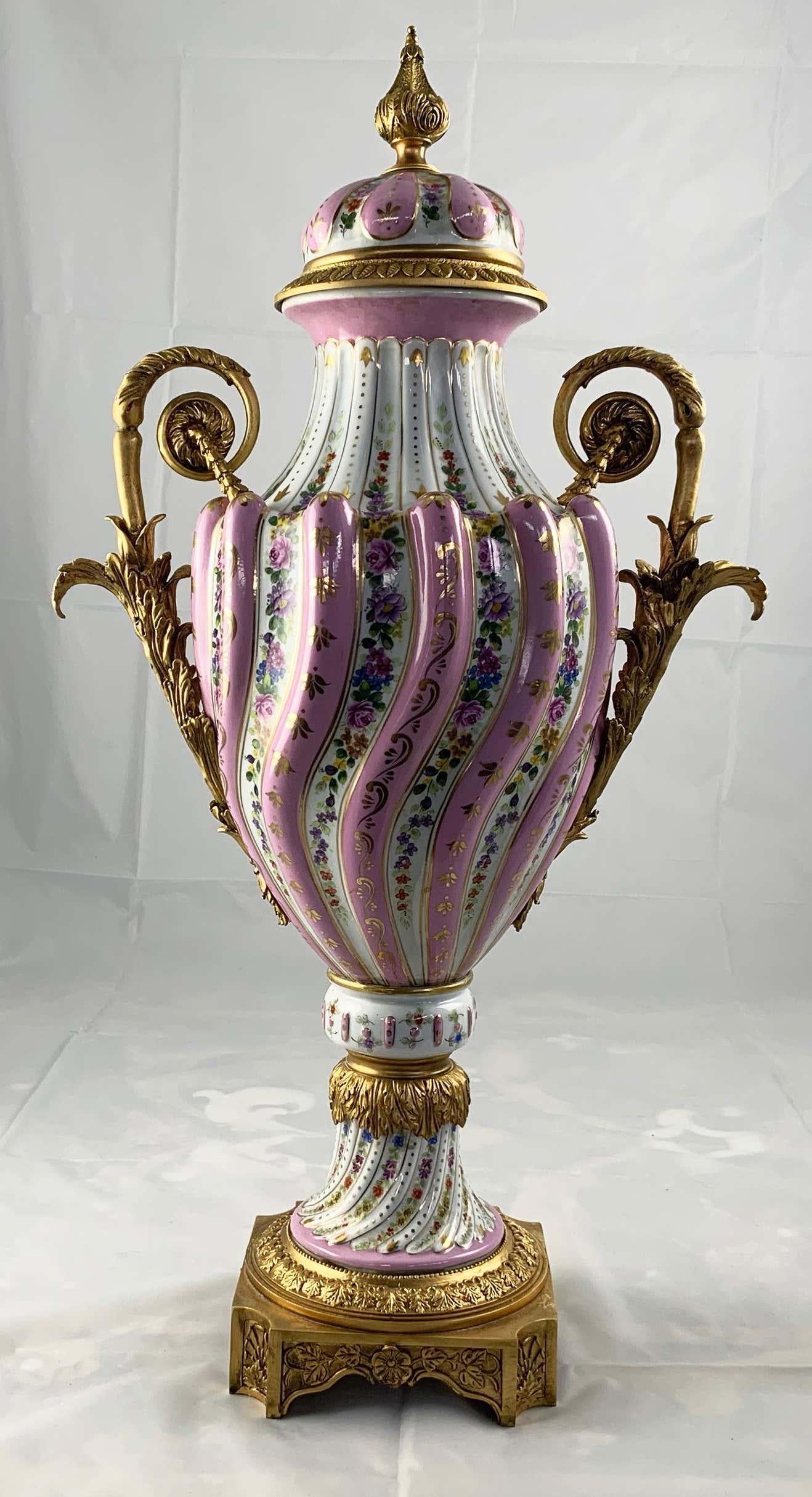 20th Century Pair of Ormolu Mounted Pink Sevres Style Vases with Lids For Sale 9
