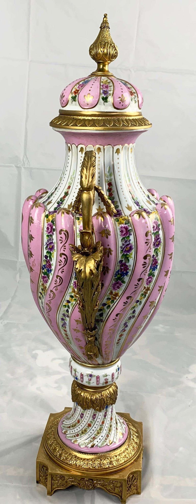 20th Century Pair of Ormolu Mounted Pink Sevres Style Vases with Lids