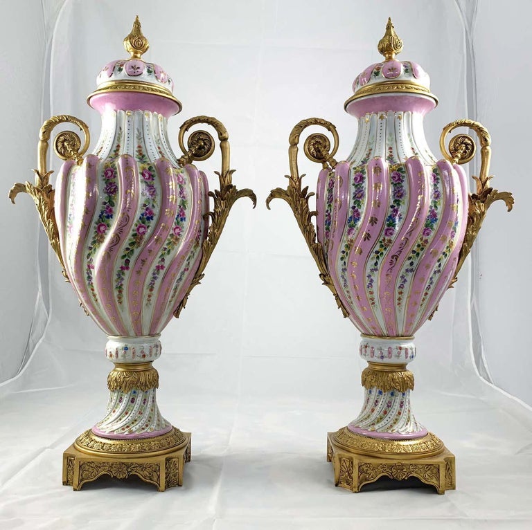 20th Century Pair of Ormolu Mounted Pink Sevres Style Vases with Lids