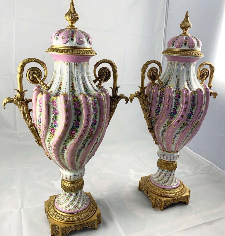 20th Century Pair of Ormolu Mounted Pink Sevres Style Vases with Lids