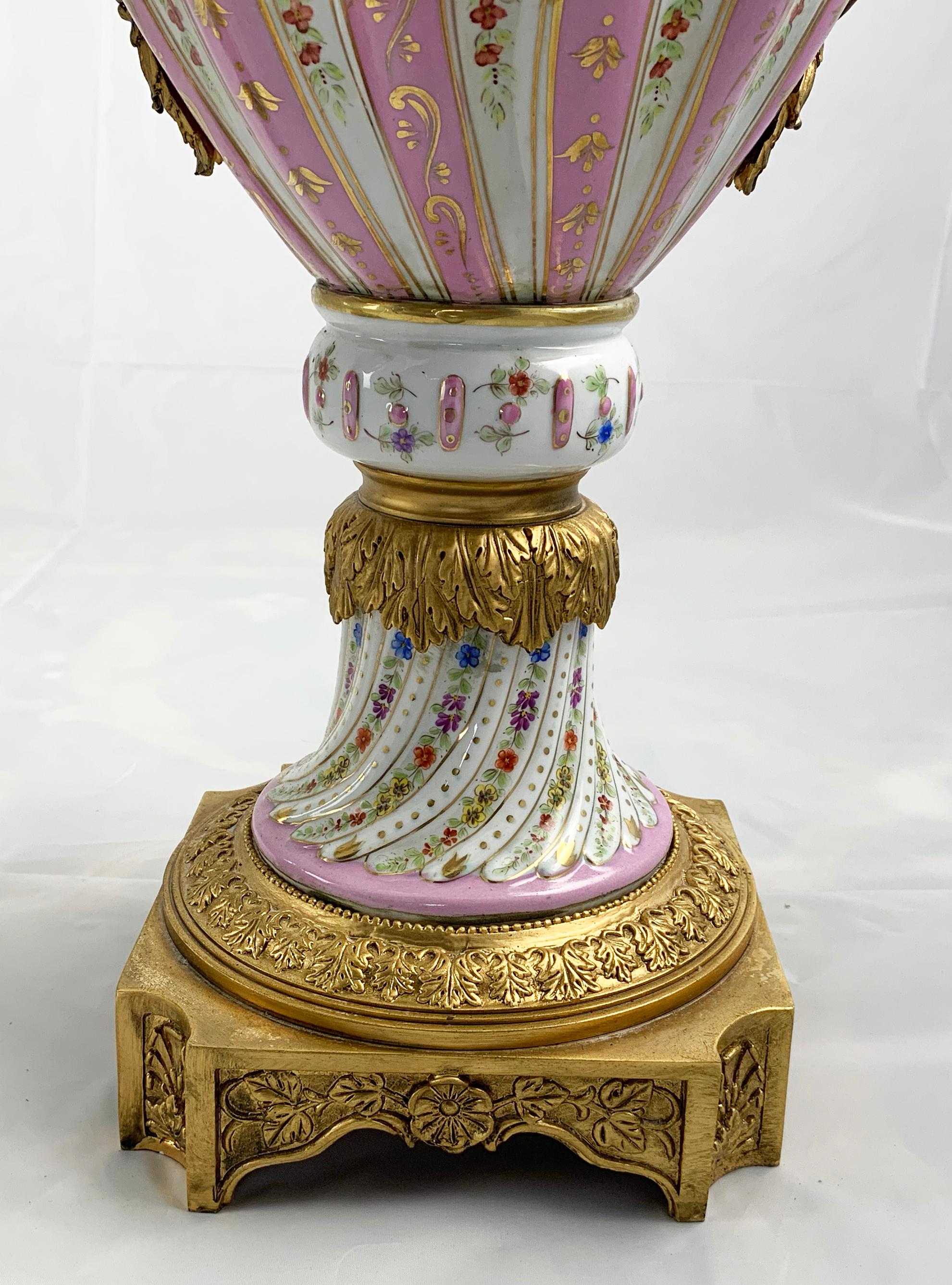 20th Century Pair of Ormolu Mounted Pink Sevres Vases with Lids For Sale 4
