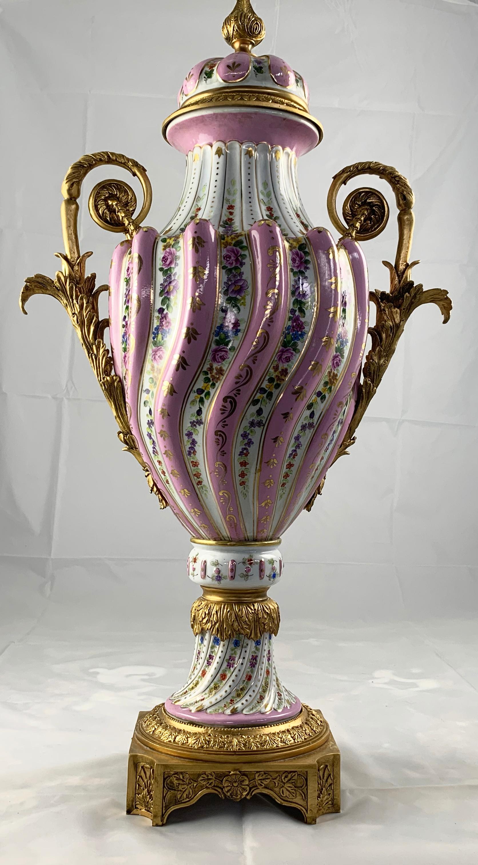 20th Century Pair of Ormolu Mounted Pink Sevres Vases with Lids For Sale 7