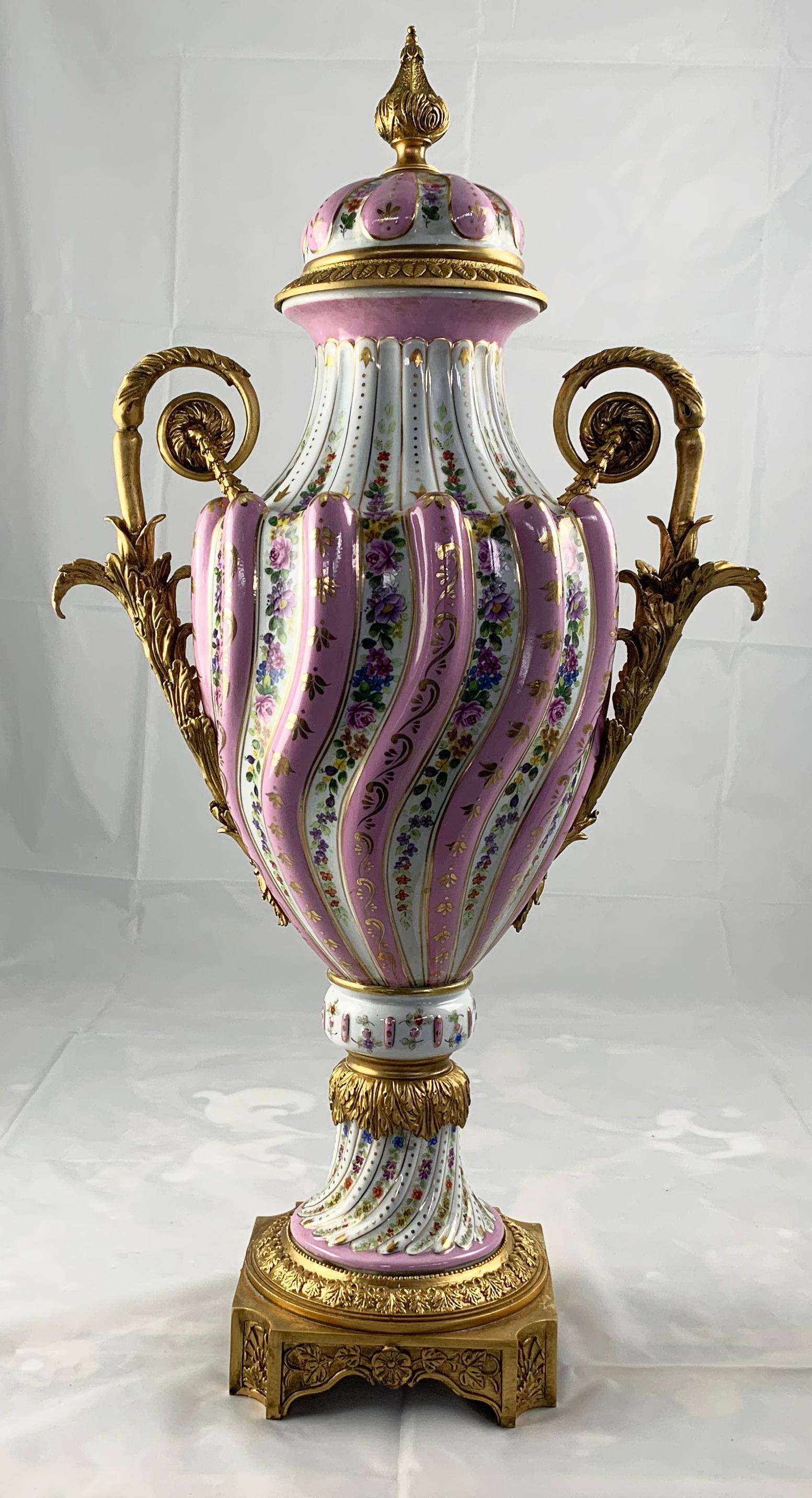 20th Century Pair of Ormolu Mounted Pink Sevres Vases with Lids For Sale 8