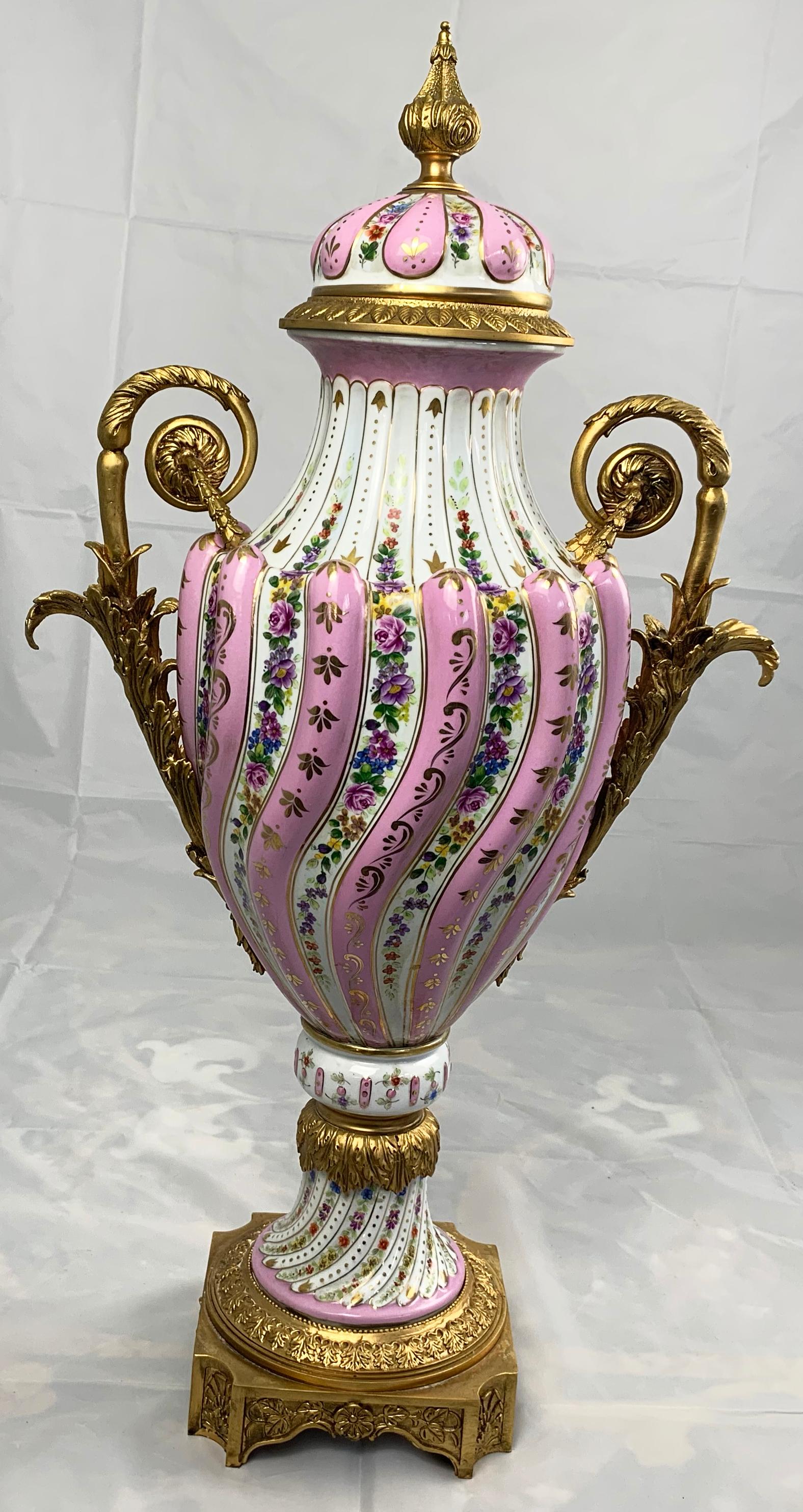 20th Century Pair of Ormolu Mounted Pink Sevres Vases with Lids For Sale 10